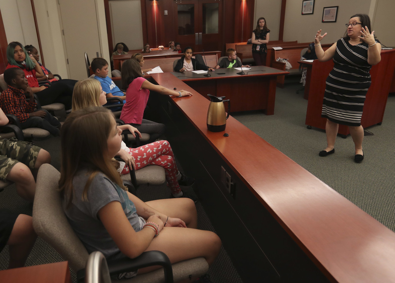 Michelle Oldroyd, director of professional education for the Utah State Bar, talks to members of the jury during a mock trial in 3rd District Court Judge Kara L. Pettit's courtroom at the Scott M. Matheson Courthouse in Salt Lake City on Monday, Sept. 17, 2018. Fifth-grade students from Nibley Park School participated in the mock trial as part of Utah Courts’ Constitution Day celebration at the courthouse. (Photo: Steve Griffin, KSL)