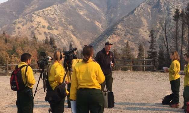 Dan Dallas (second from right), fire planning chief on the Bald Mountain Fire, took KSL 5 behind the fire lines on Wednesday, Sept. 19, 2018. (Photo: KSL TV)