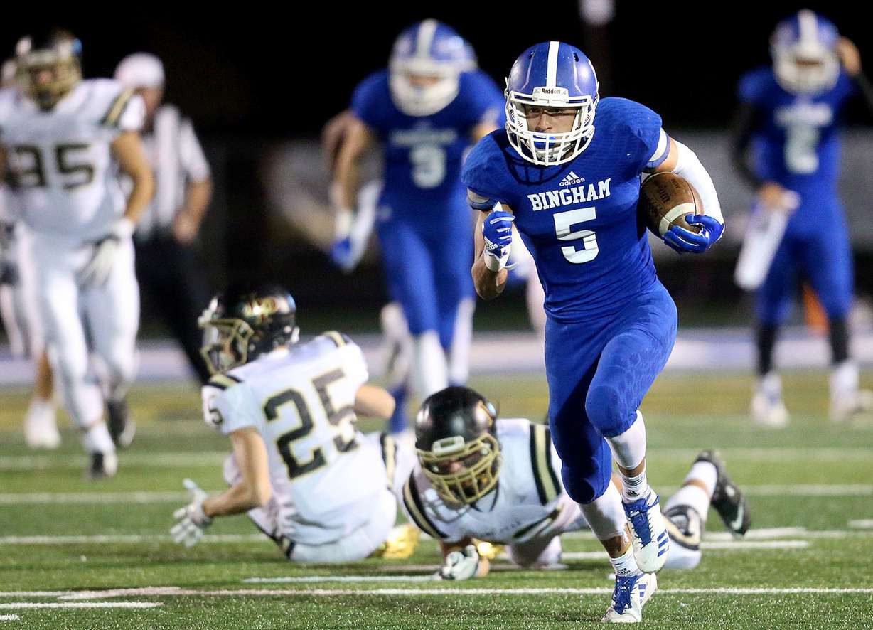 Bingham's Dax Milne runs for a touchdown during a football game against Lone Peak at Bingham High School in South Jordan, on Friday, Sept. 29, 2017. Bingham won 28-10. (Photo: Kristin Murphy, Deseret News)
