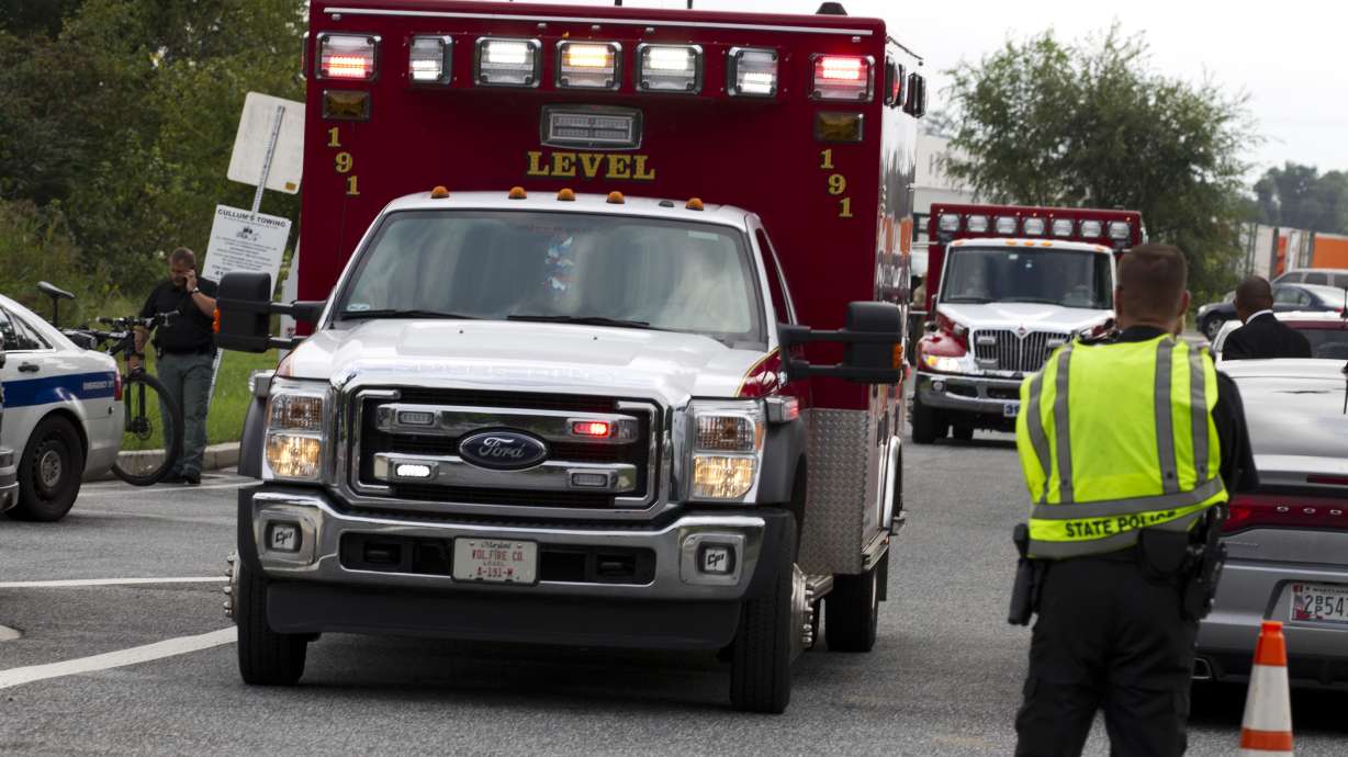 The Latest: Warehouse shooting victim had new wife, new job