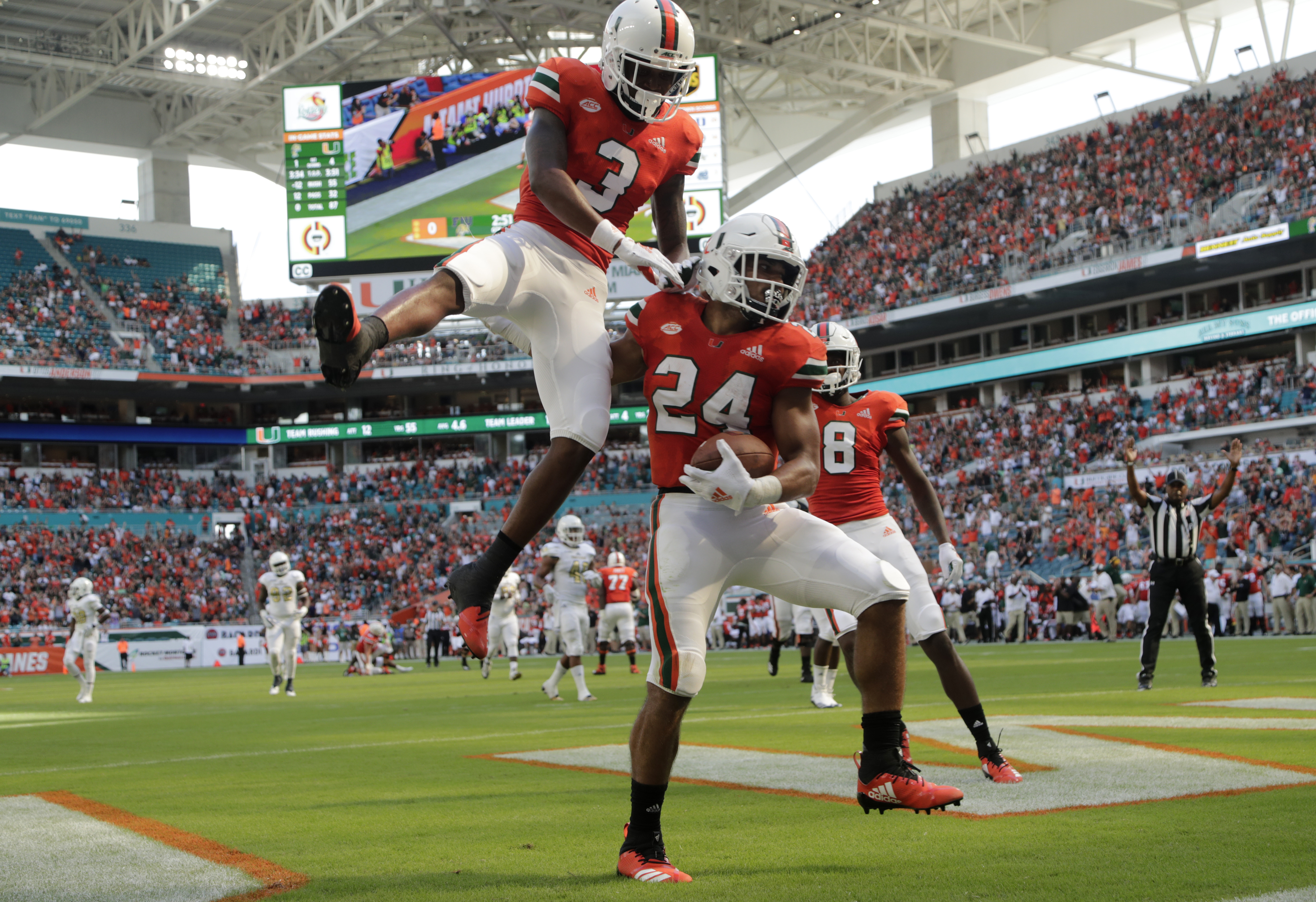 N'Kosi Perry sparks No. 21 Miami past FIU, 31-17