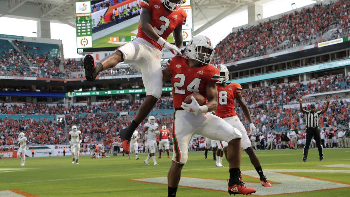 N'Kosi Perry sparks No. 21 Miami past FIU, 31-17