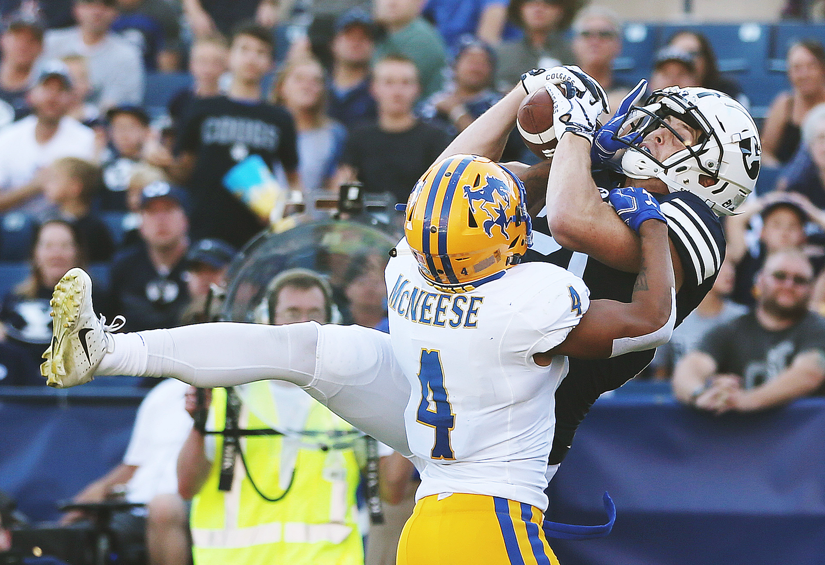 BYU wide receiver Talon Shumway (21) grabs a touchdown over McNeese State Cowboys defensive back Colby Burton (4) in Provo on Saturday, Sept. 22, 2018. (Photo: Jeffrey D. Allred, Deseret News)