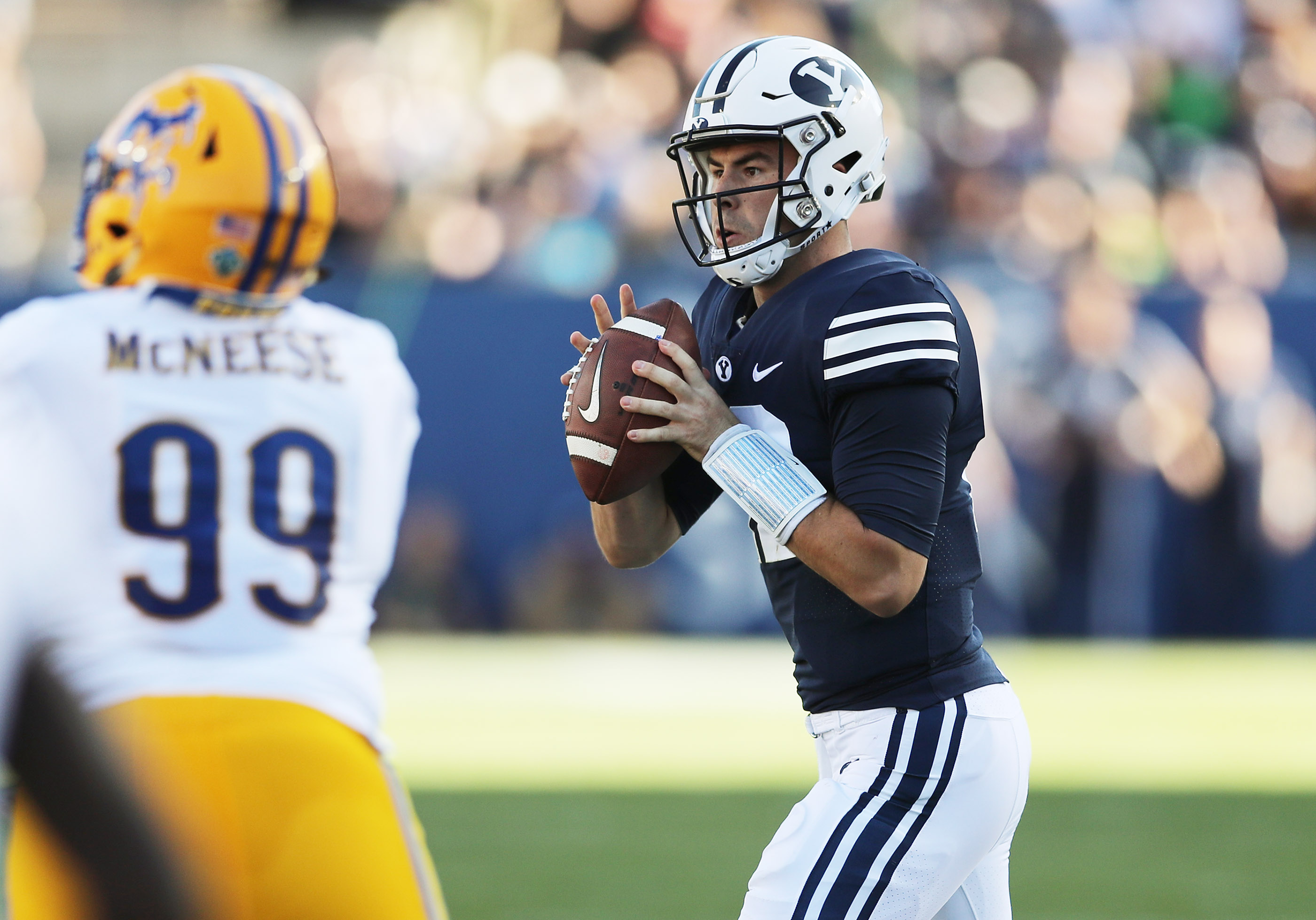 BYU quarterback Tanner Mangum (12) throws in Provo on Saturday, Sept. 22, 2018. (Photo: Jeffrey D. Allred, Deseret News)