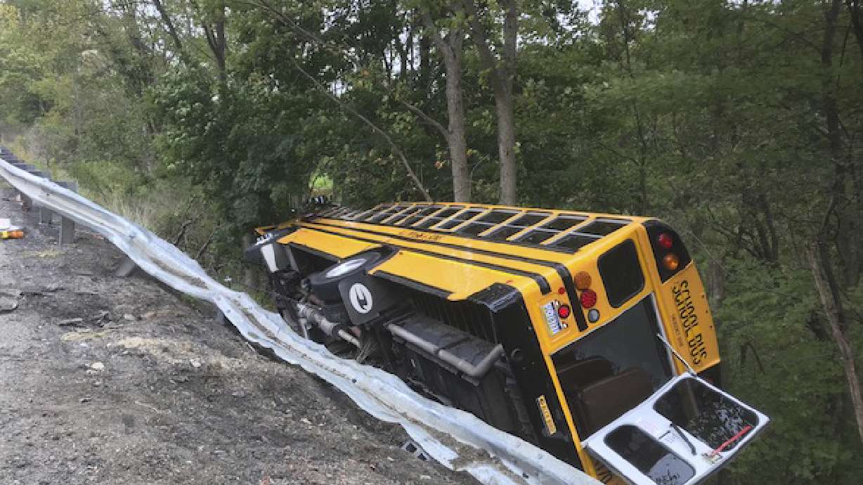 School bus lands on side in crash; minor injuries reported