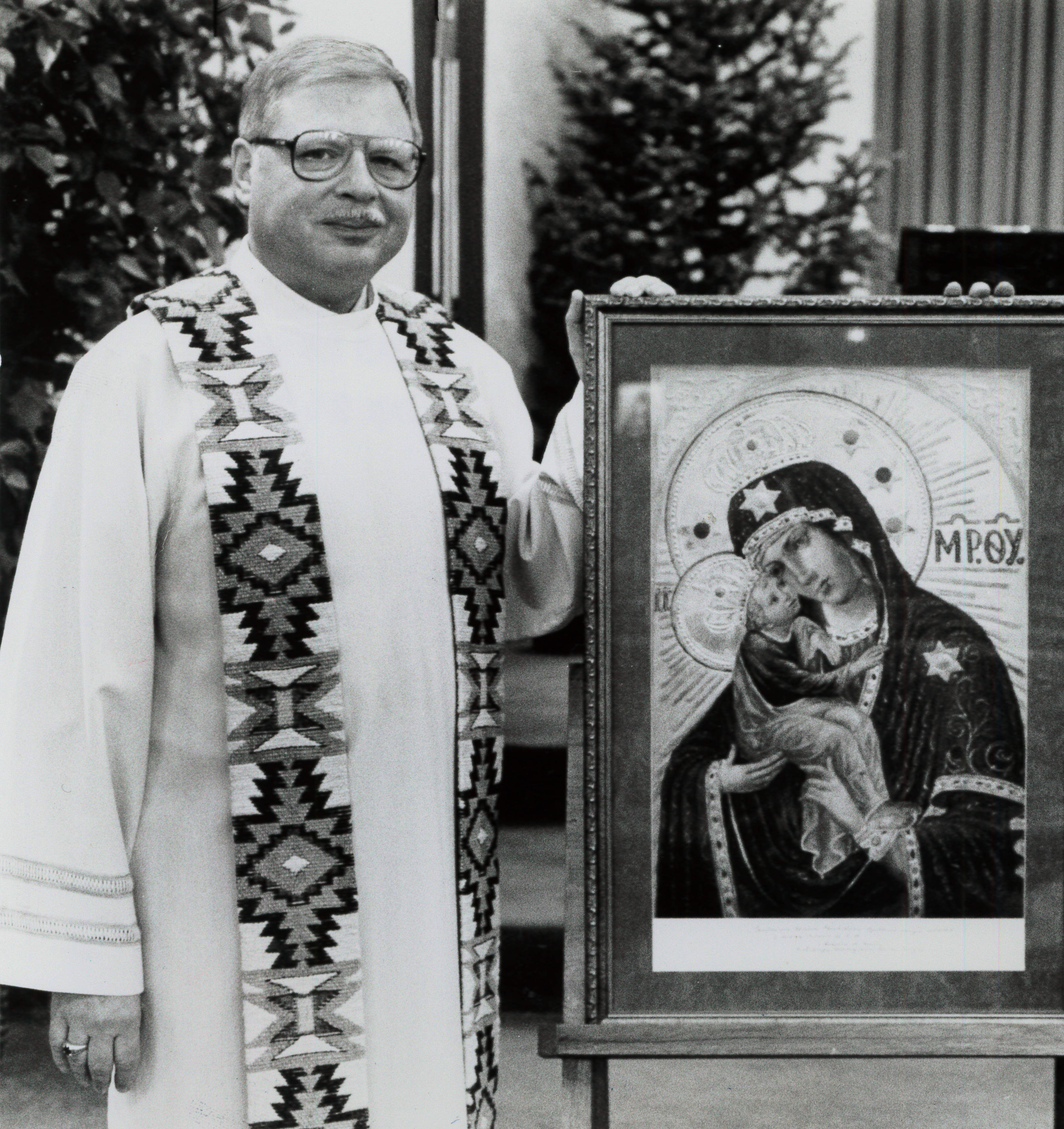 Priest accused of child sex abuse behind bars pending trial