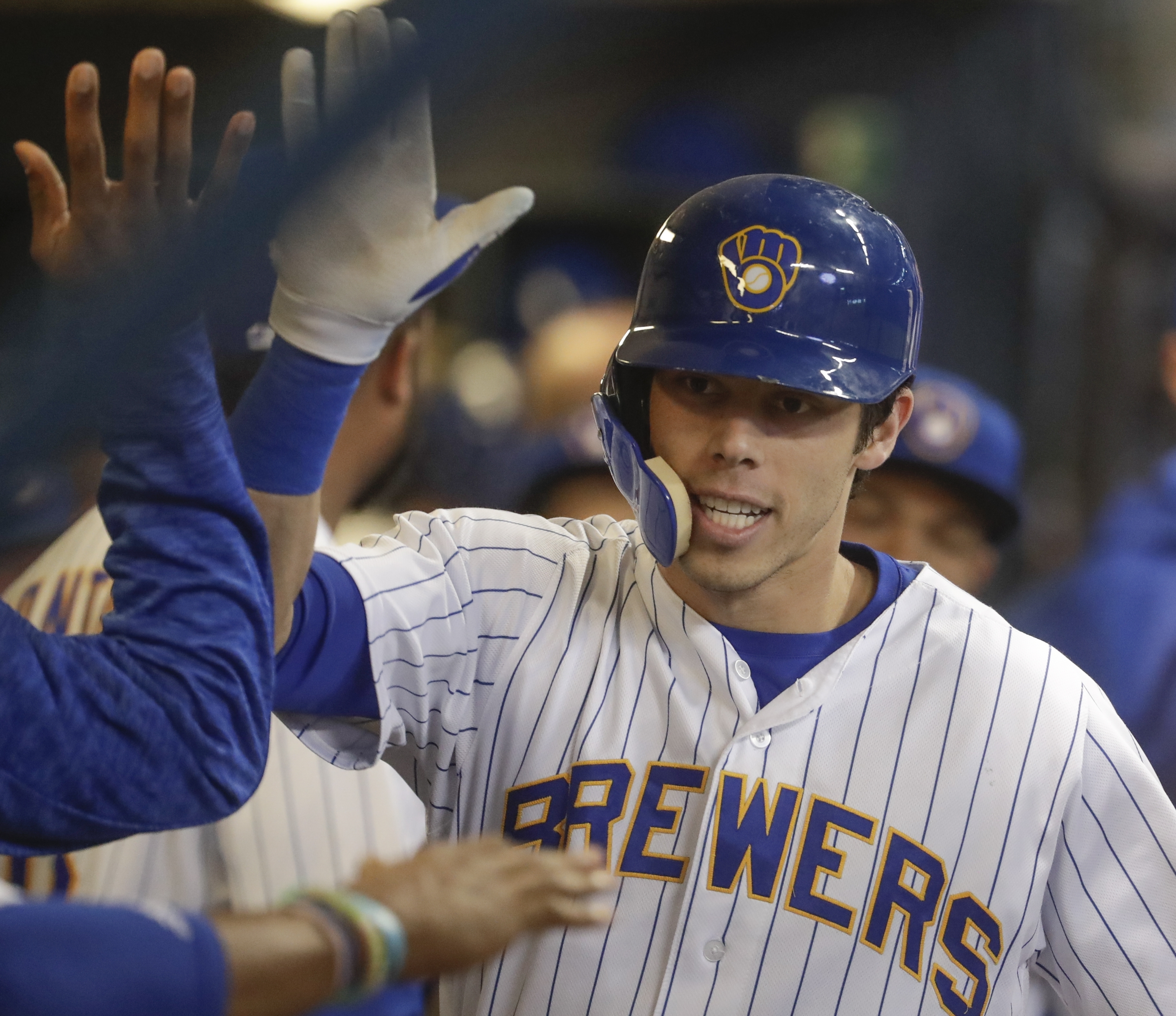 Making MVP push, Brewers' Yelich is back with Marine brother