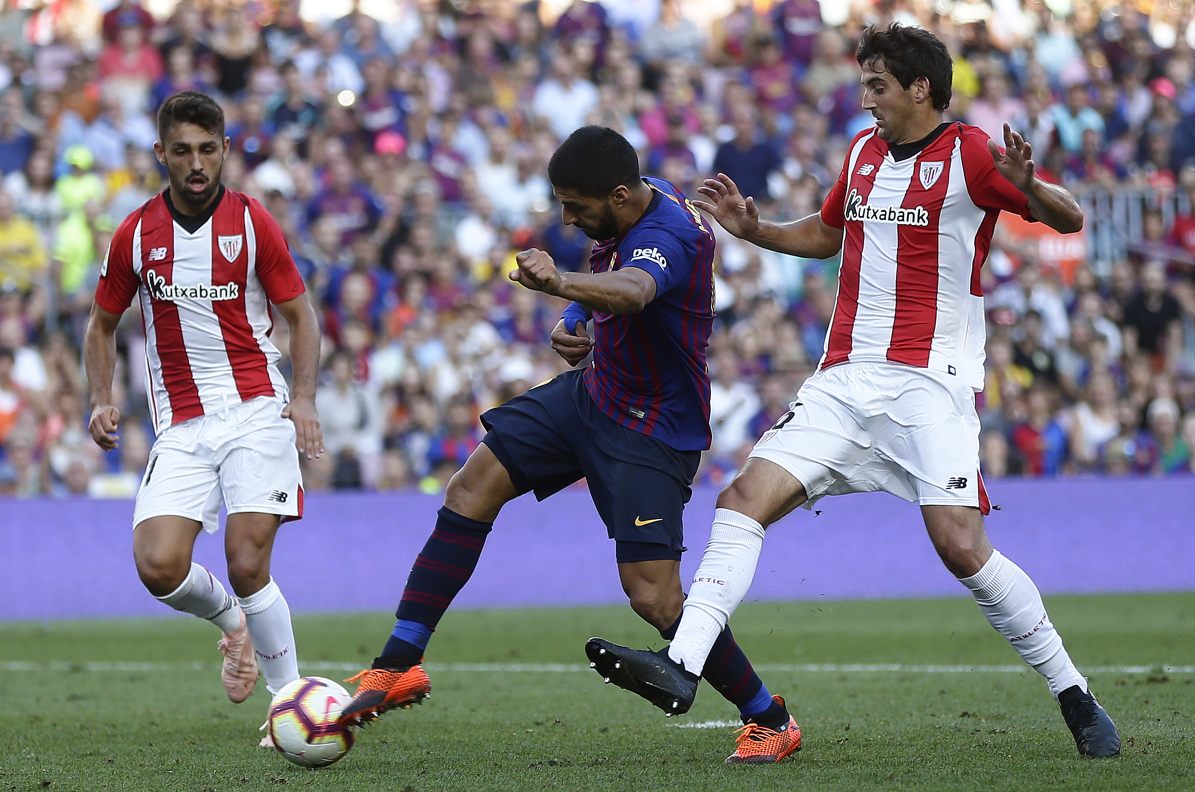 Madrid and Atletico draw in derby, Barcelona stays ahead