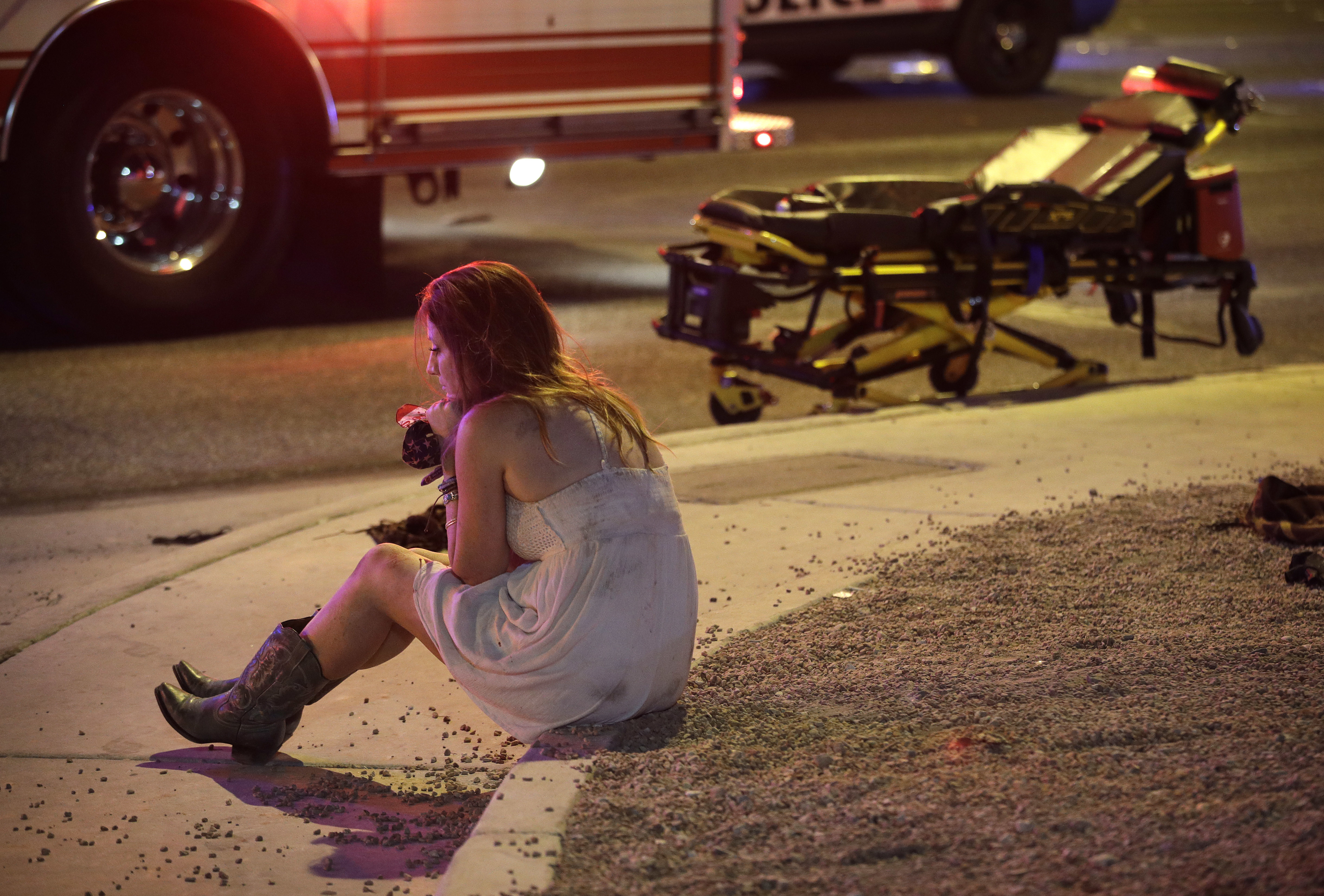 The Latest: Vegas shooting survivors form human chain