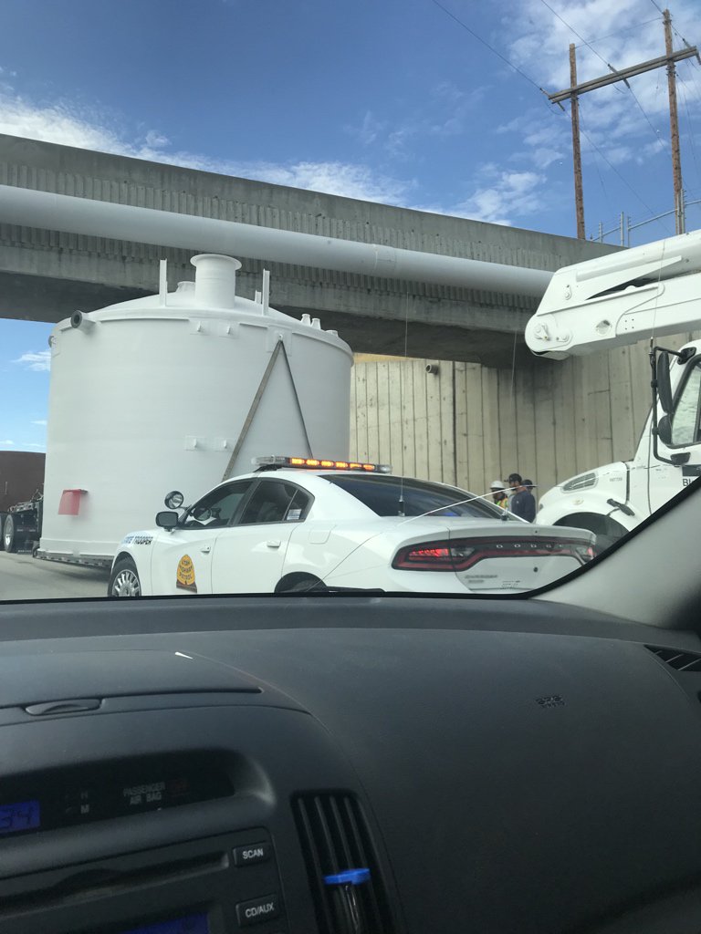 Truck stuck underneath highway in West Jordan extricated 2 hours later