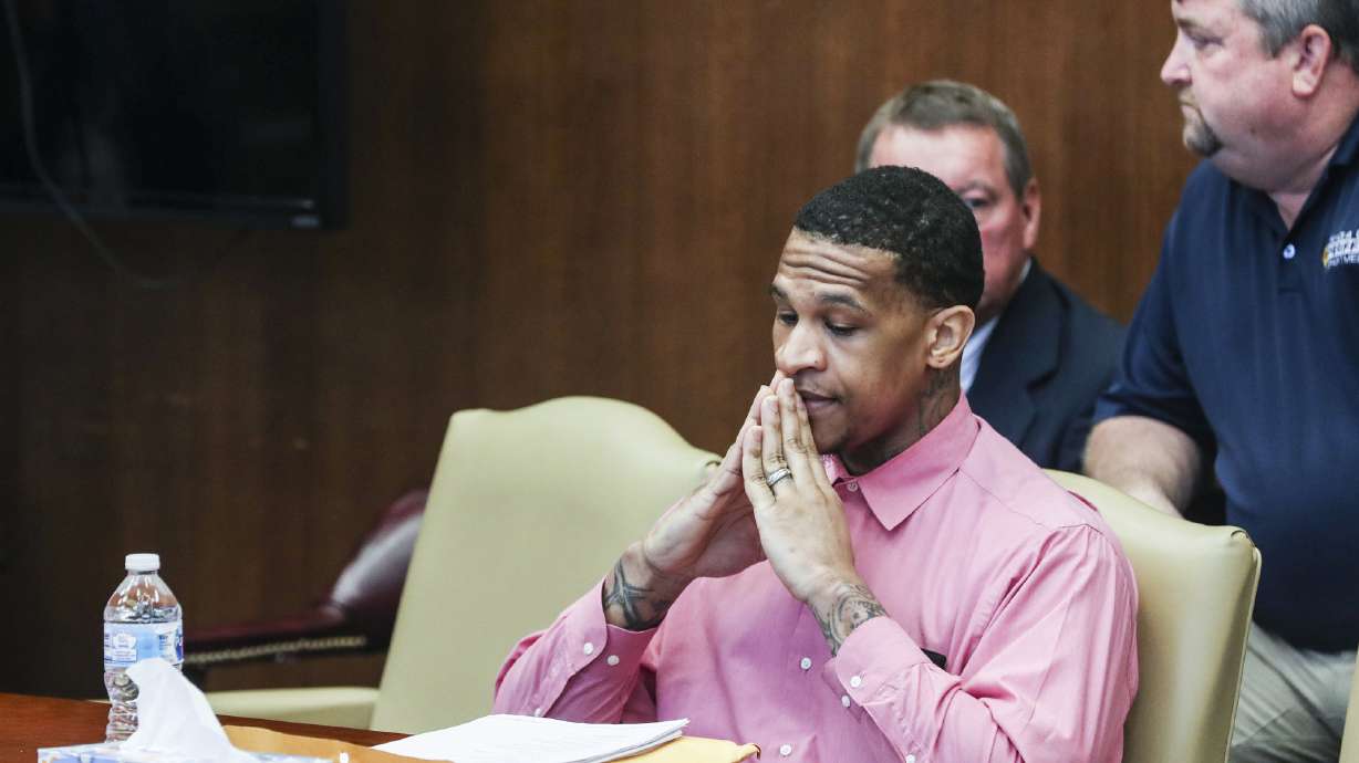 The Latest: Prosecutor unsure on third trial in burning case