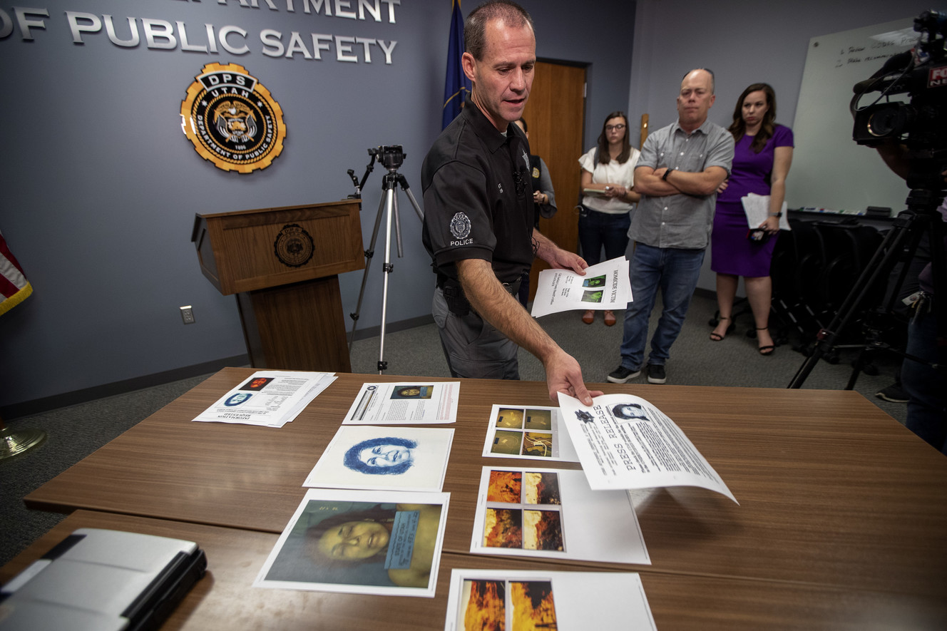Agent Brian Davis, with the State Bureau of Investigation, shows photos and other information pertaining a cold case homicide from April 1998 during a press conference in West Valley City on Tuesday, Oct. 2, 2018. Agents are asking for the public’s help in identifying a woman whose body was found by a passerby on the side of state Route 276 approximately 38 miles north of Lake Powell. (Photo: Scott G Winterton, KSL)