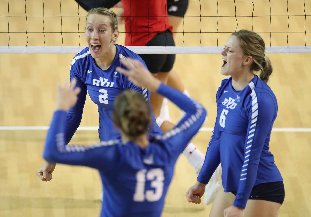 BYU's Heather Gneiting (2) and BYU's Lyndie Haddock-Eppich celebrate a point against Utah in Provo on Thursday, Sept. 13, 2018. (Photo: Jeffrey D. Allred, Deseret News)