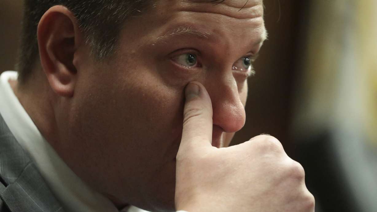 The Latest: Alternates say they would've convicted officer