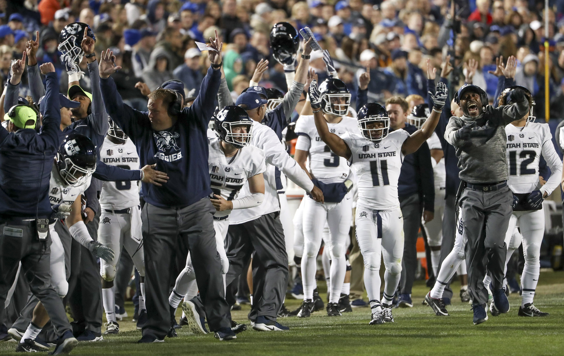 The Utah State Aggies beach celebrates a touchdown during the Utah State versus BYU football game at LaVell Edwards Stadium in Provo on Friday, Oct. 5, 2018. (Photo: Steve Griffin, KSL)