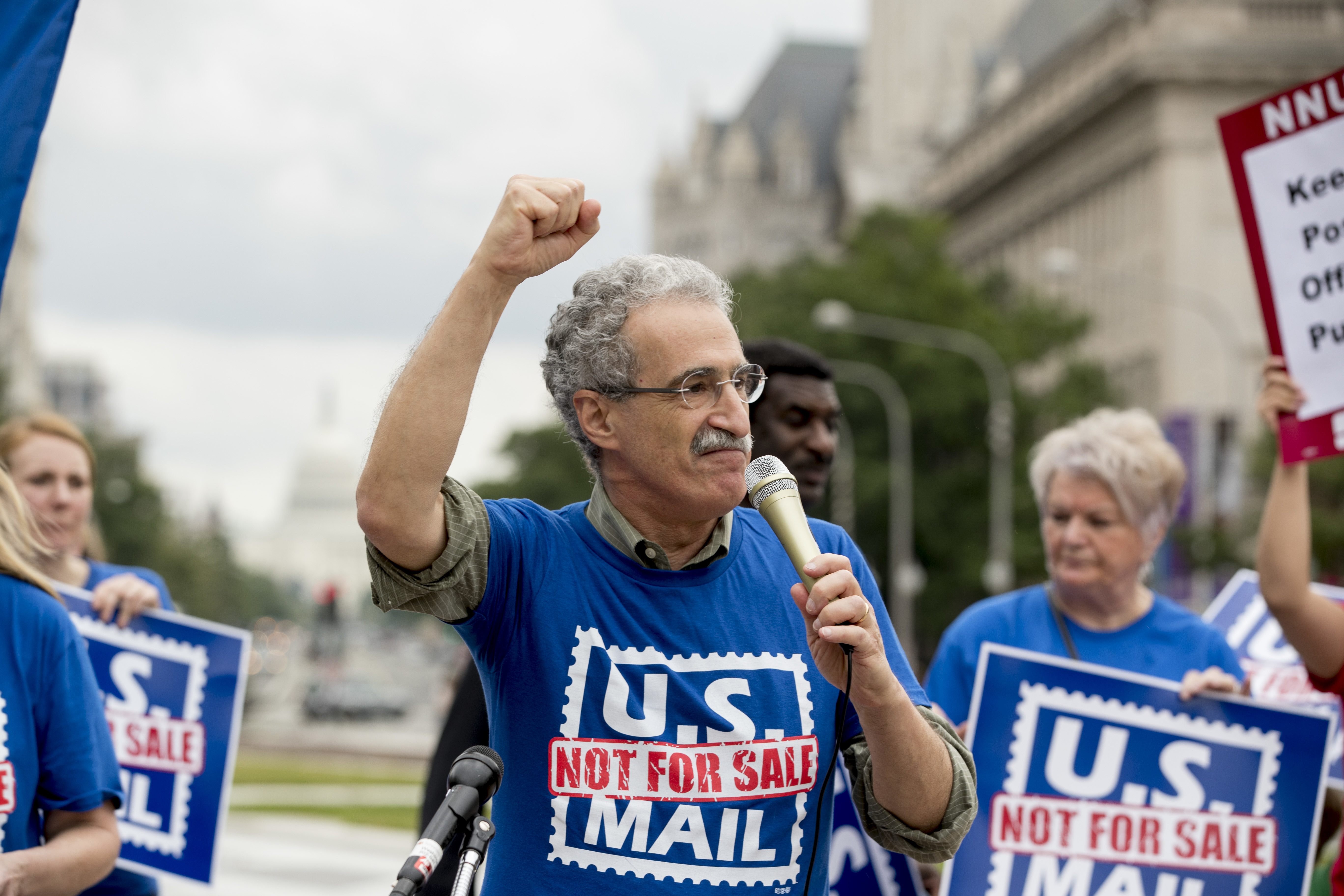 Workers rally amid White House push for postal changes