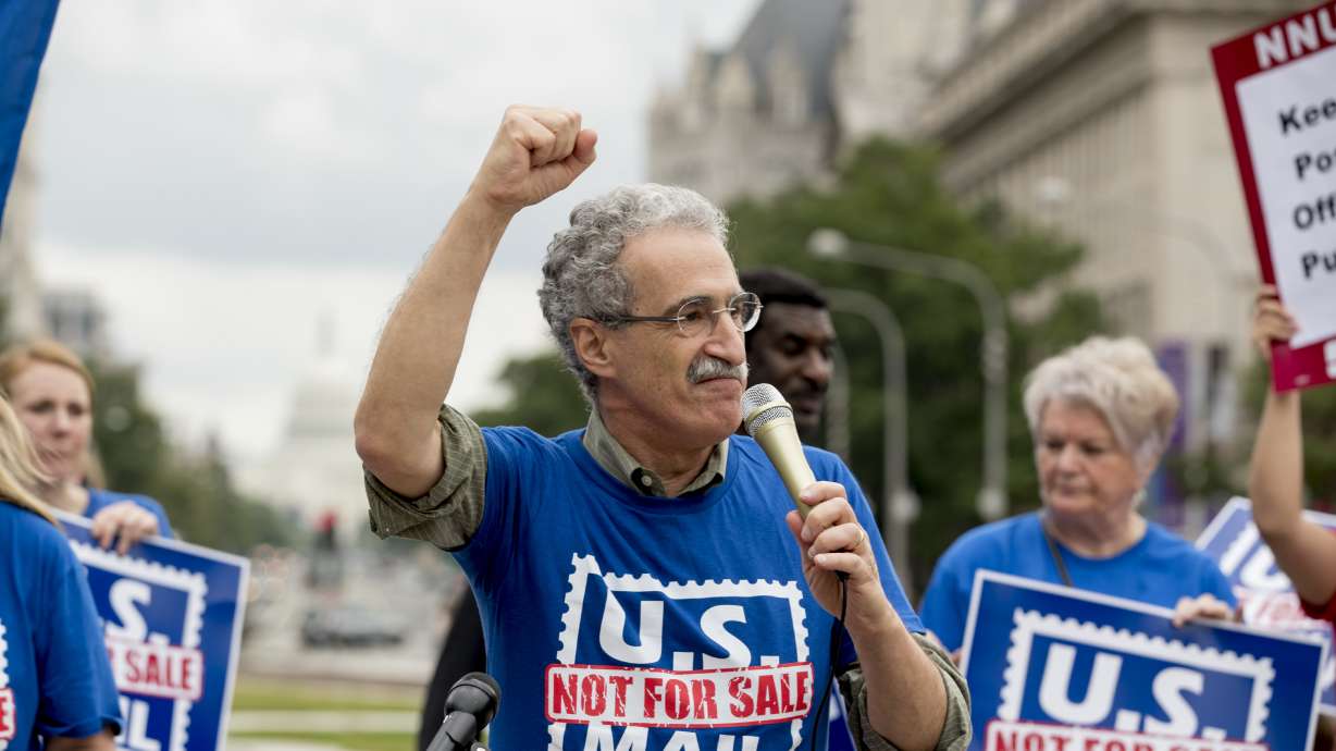 Workers rally amid White House push for postal changes