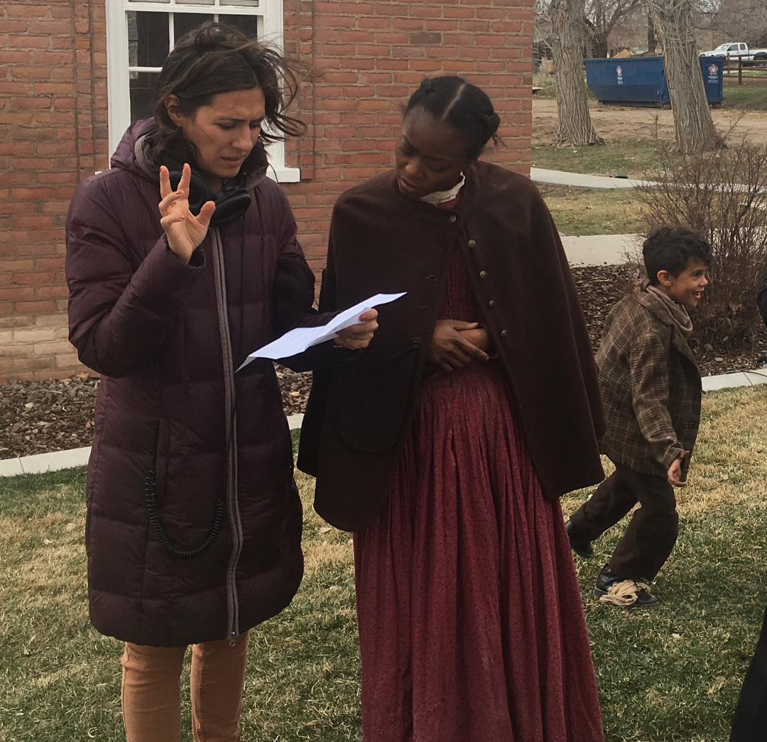 Director Chantelle Squires (left) talks to Danielle Deadwyler (right), playing Jane Manning on the set of "Jane and Emma." (Photo: Courtesy of Excel Entertainment)