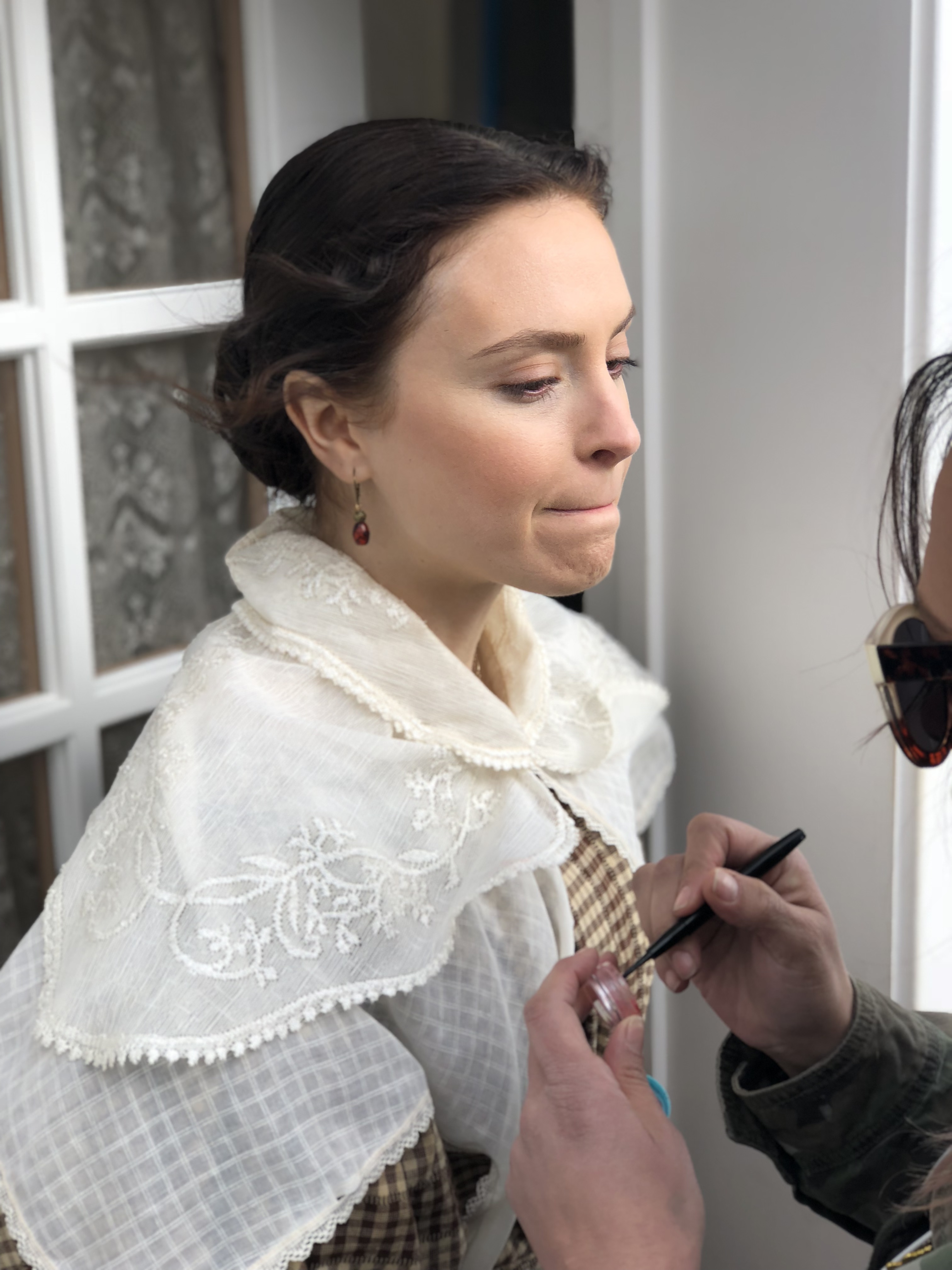 Emily Goss, playing Emma Smith, gets her makeup done on the set of "Jane and Emma." (Courtesy of Excel Entertainment)