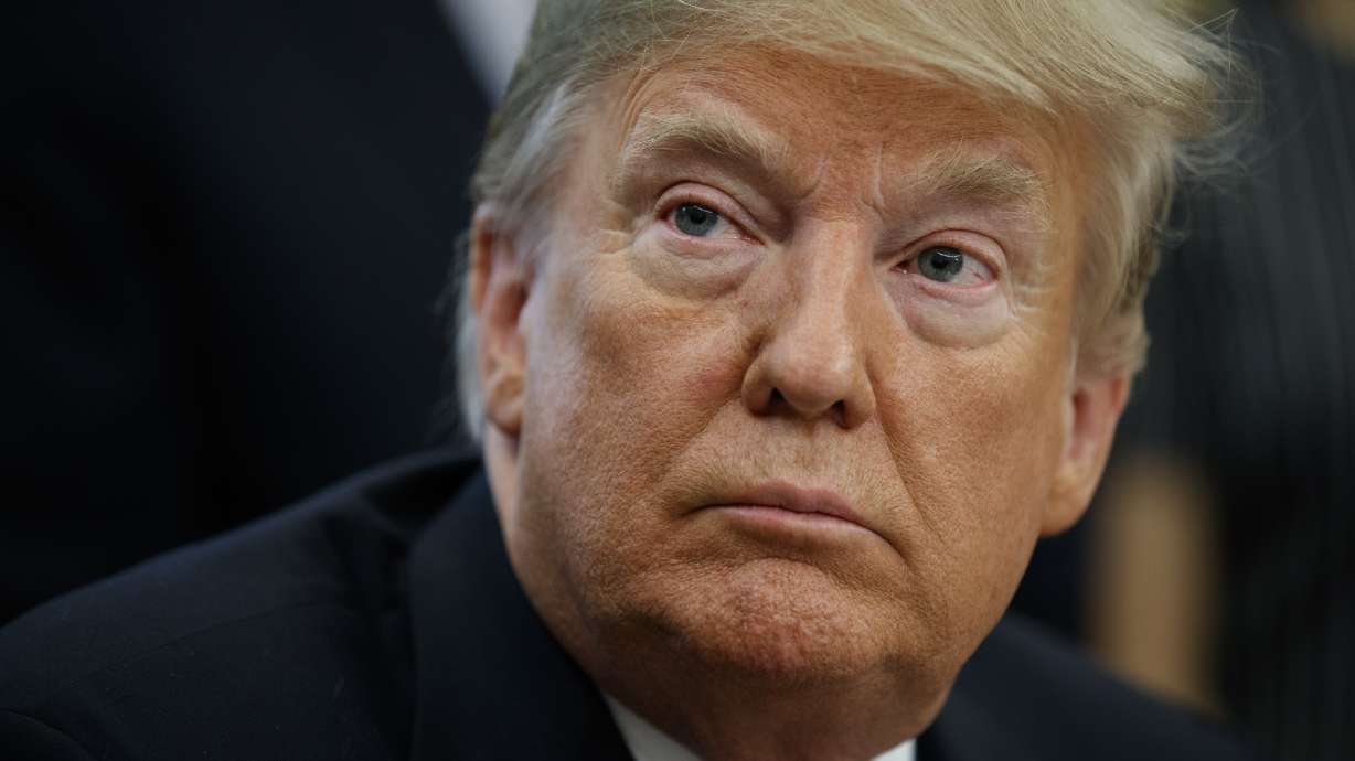 Trump steps up his attacks on Federal Reserve's rate hikes