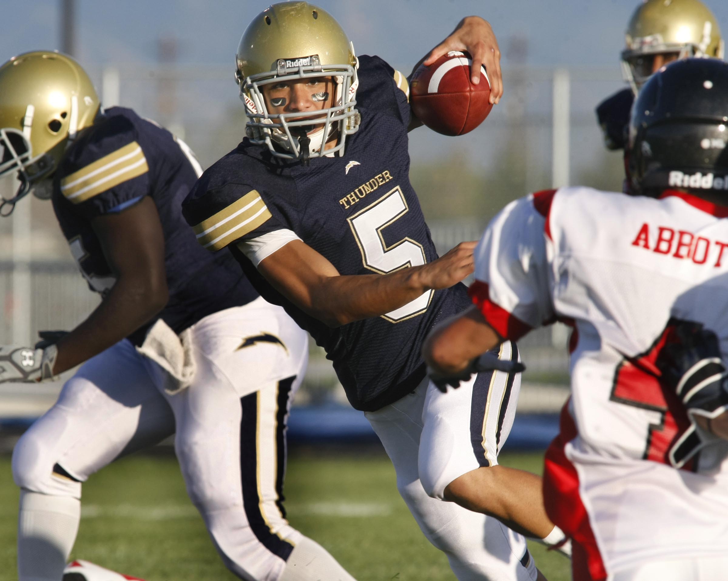 Westlake High's John Ursua slips through a hole in the line as he runs up field, Friday, Aug. 20, 2010 against Delta. (Photo: Stuart Johnson, Deseret News archives)