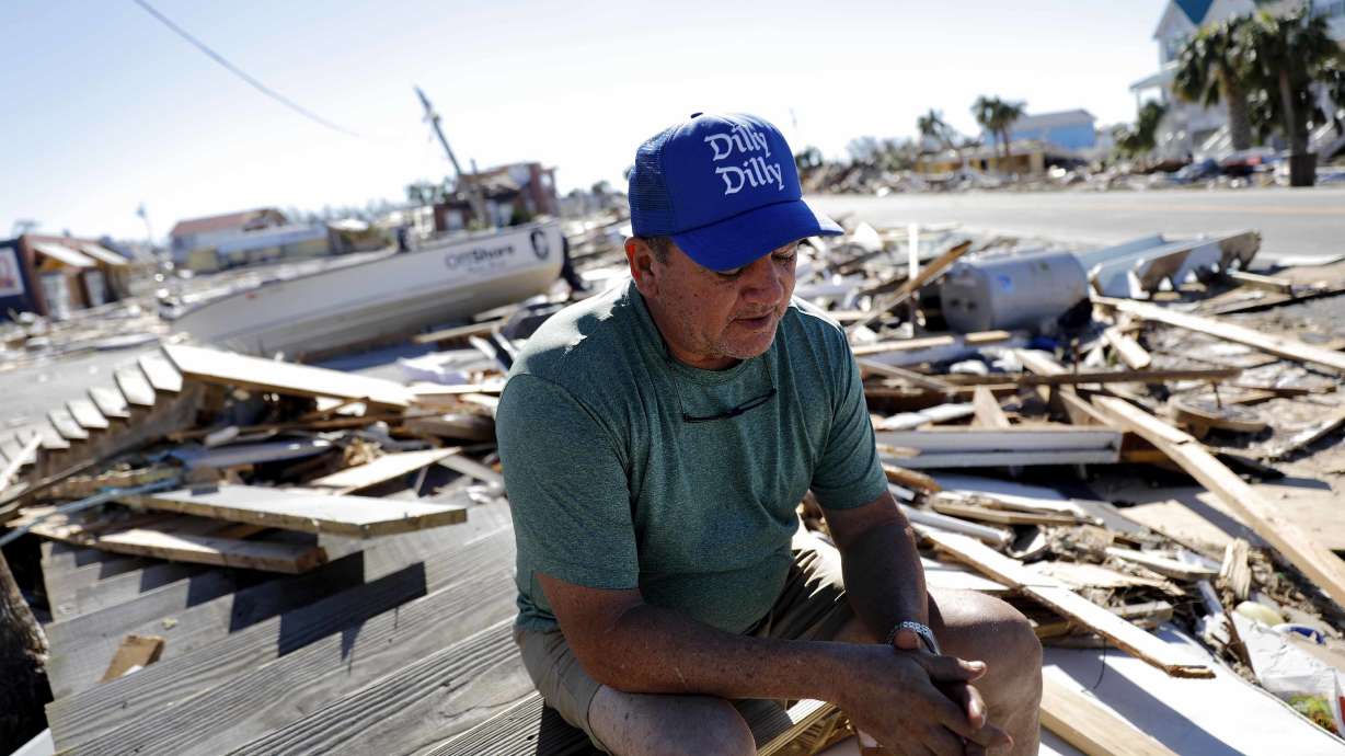 Hurricane survivors wander debris, search for the missing