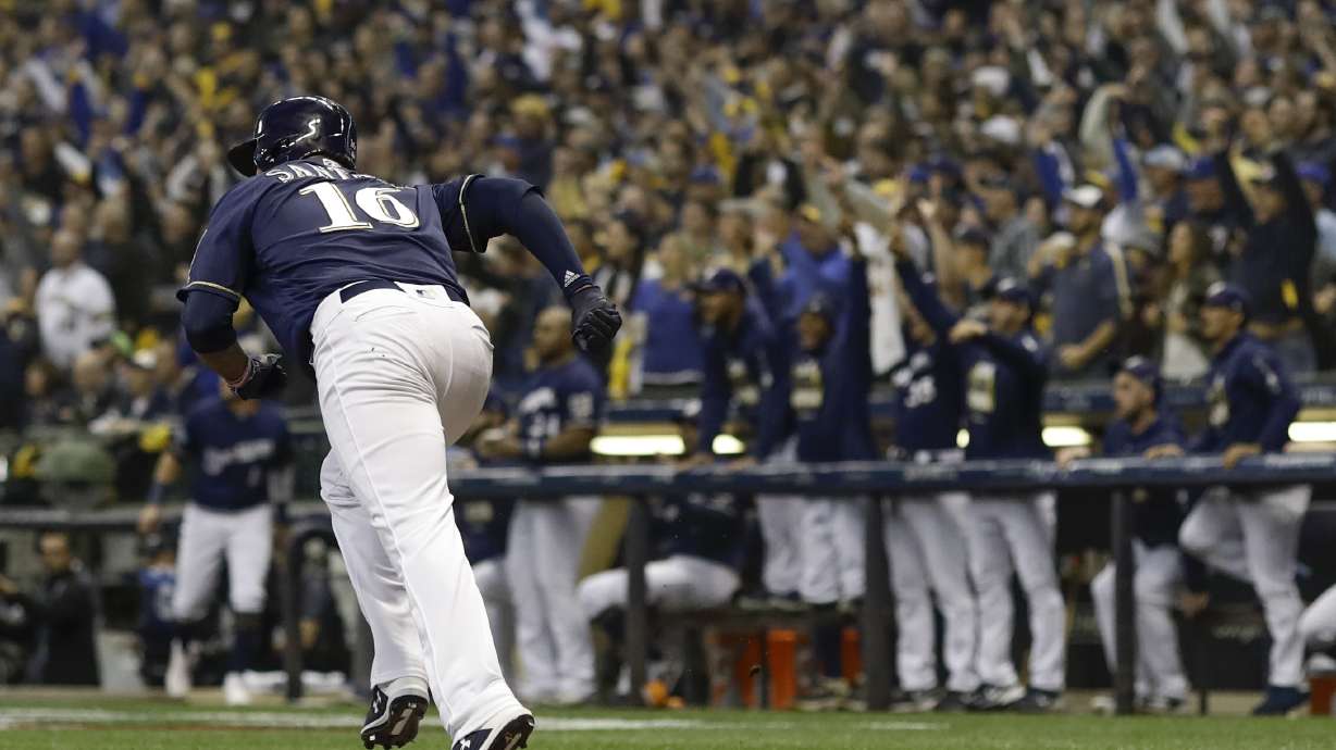 Reliever Woodruff's homer stuns Kershaw, Brewers take Game 1