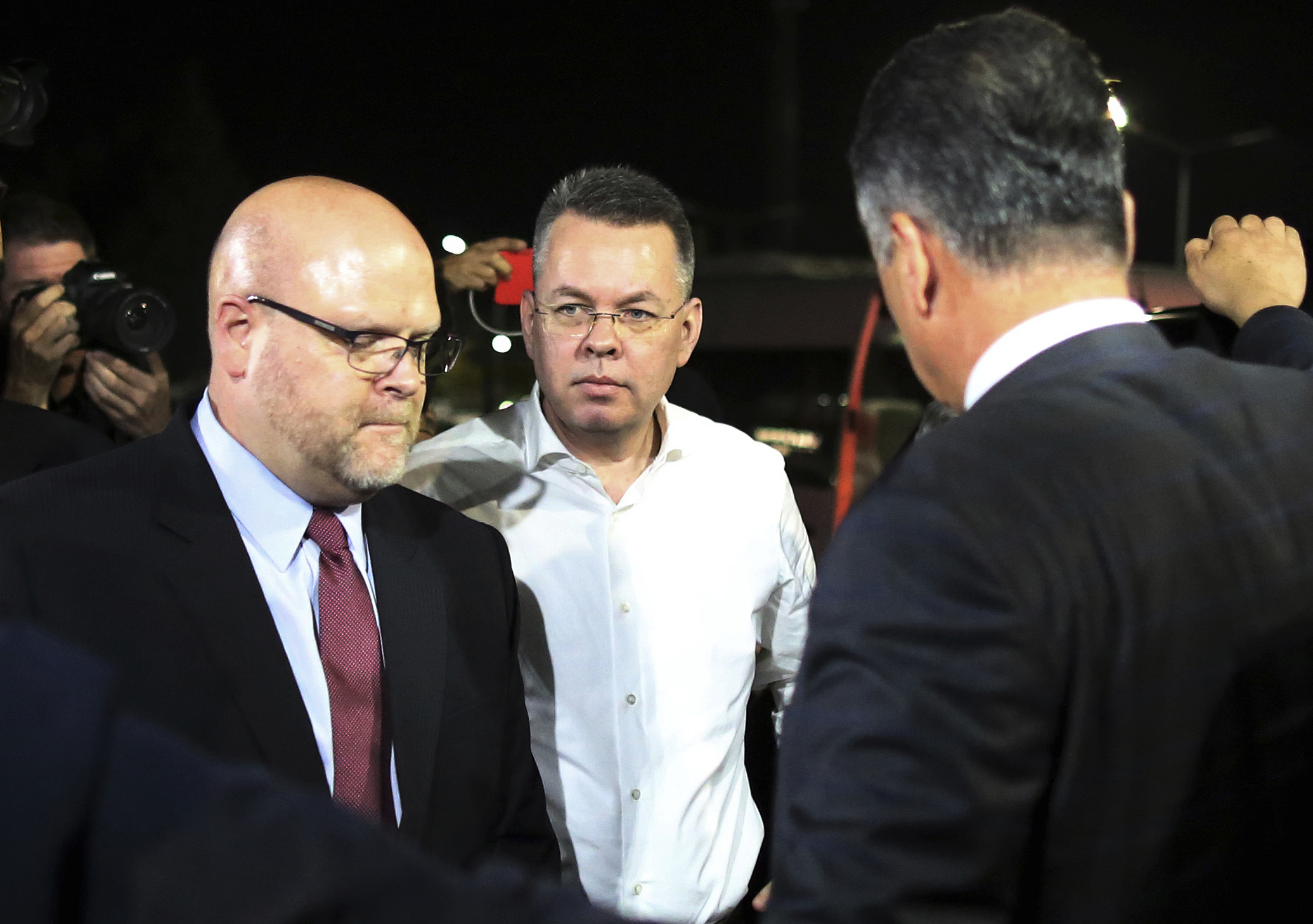 The Latest: Freed pastor prays for Trump in Oval Office