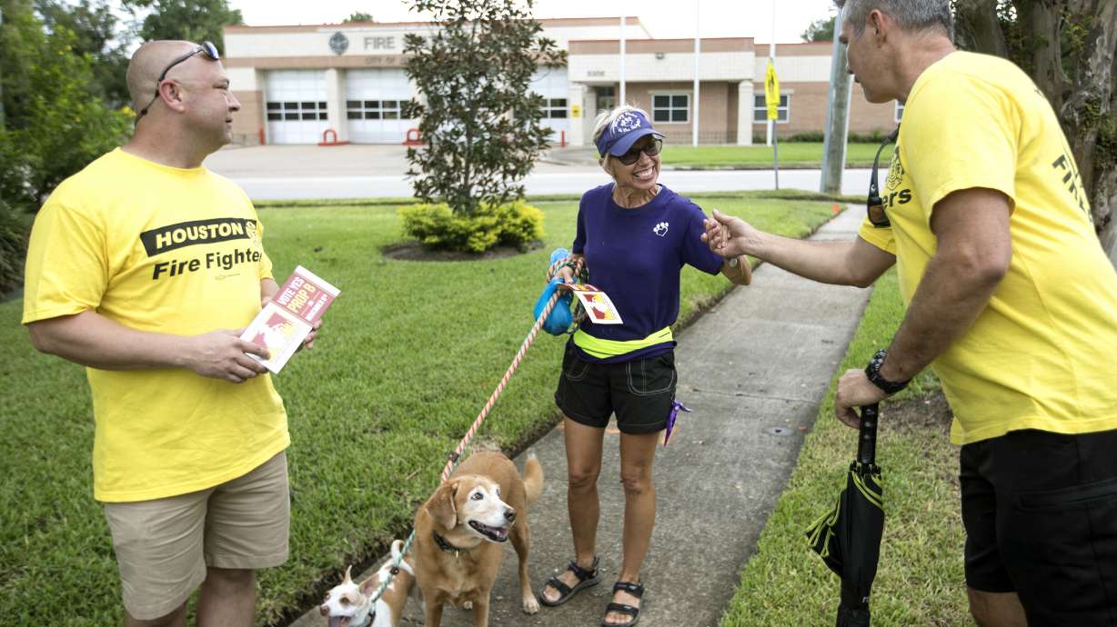 Houston firefighters take battle over pay to voters