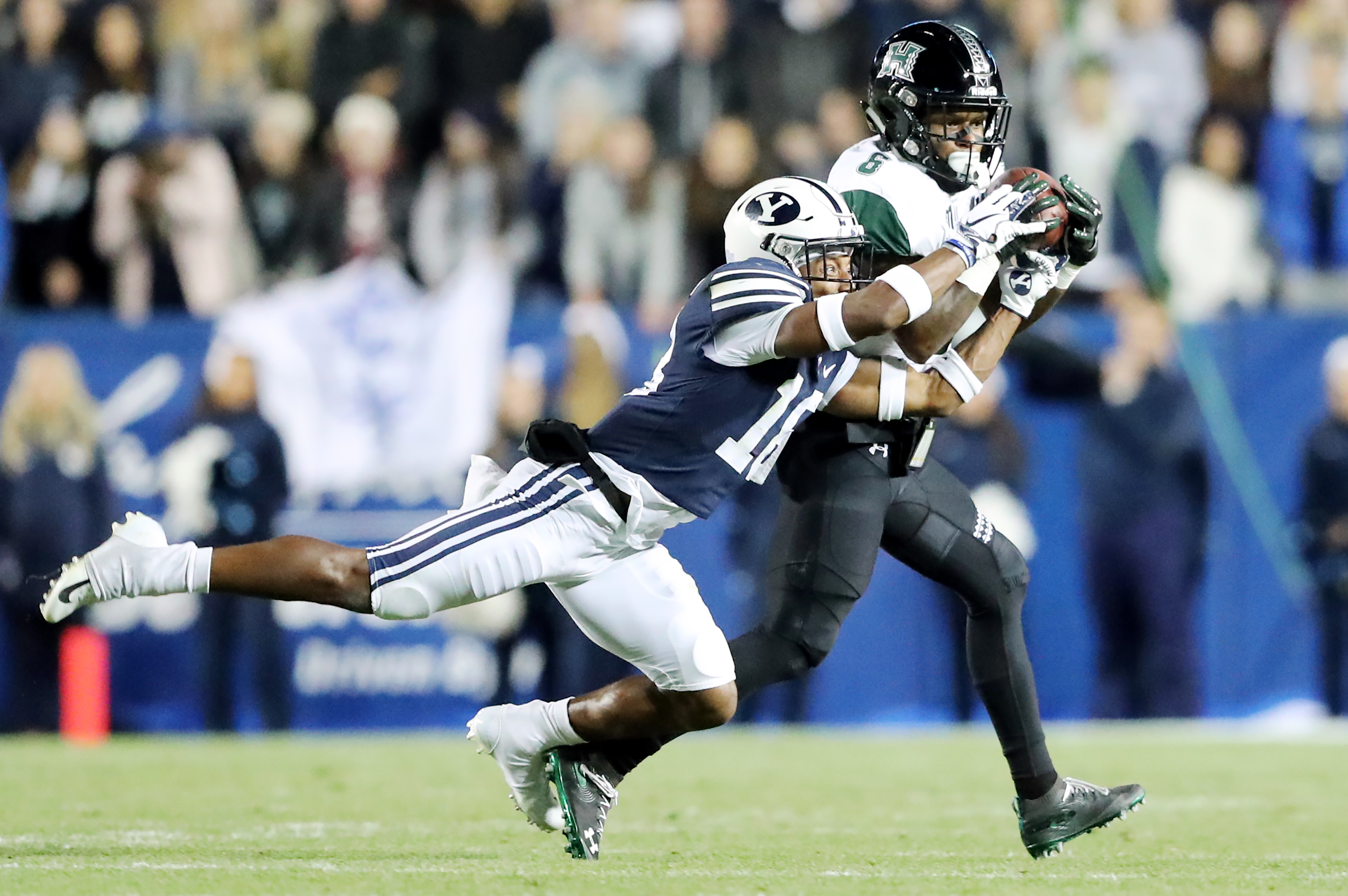 Brigham Young Cougars defensive back Michael Shelton (18) tries to defend a pass to Hawaii Warriors wide receiver Cedric Byrd (6) as BYU and Hawaii play at LaVell Edwards Stadium in Provo on Saturday, Oct. 13, 2018. (Photo: Scott G Winterton, Deseret News)