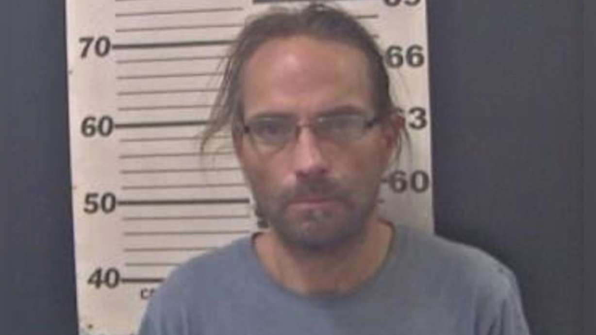 Man arrested following Sandy woman's death faces drug, weapon charges