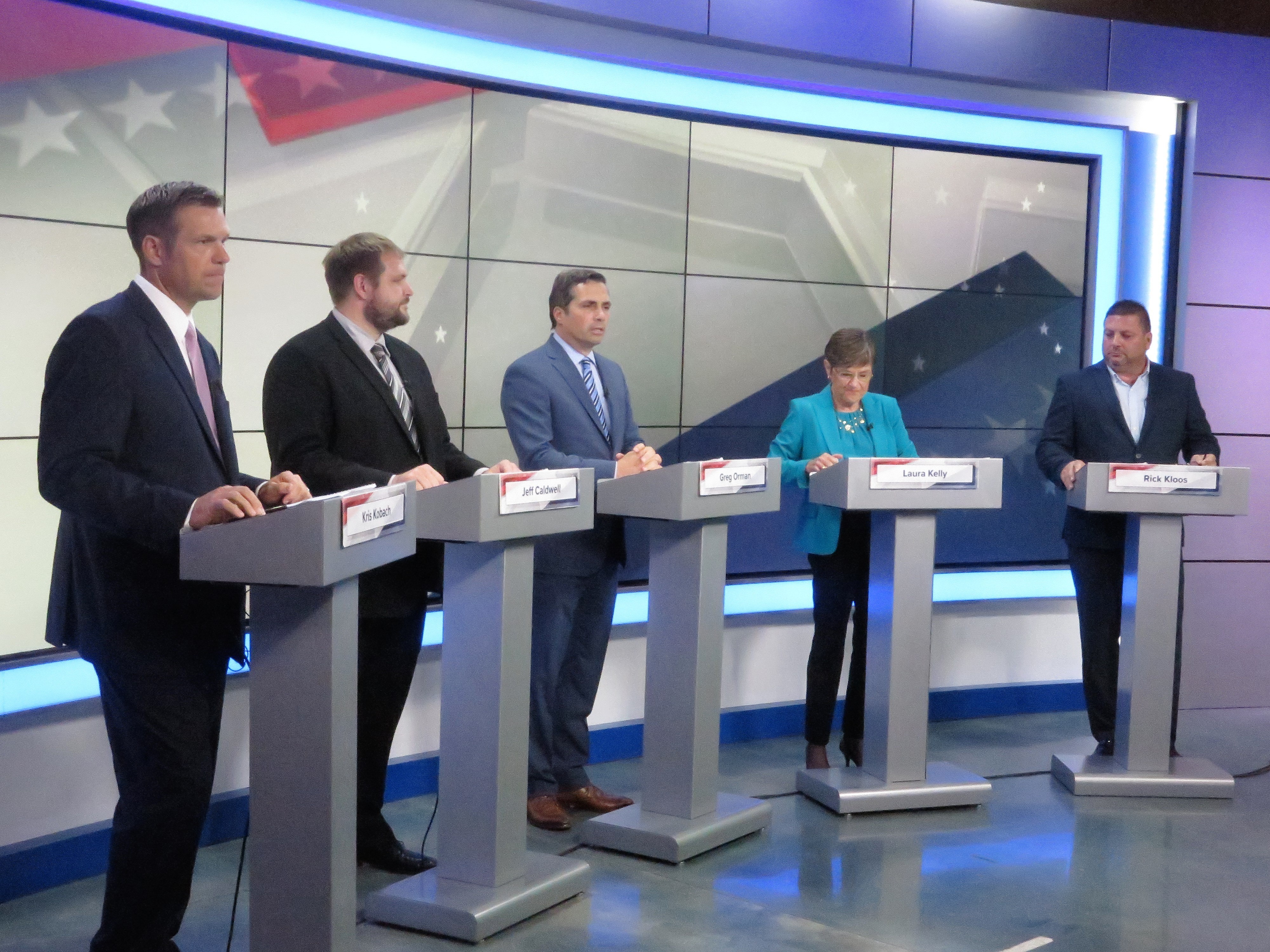 Kansas governor's race is referendum on notorious tax cuts