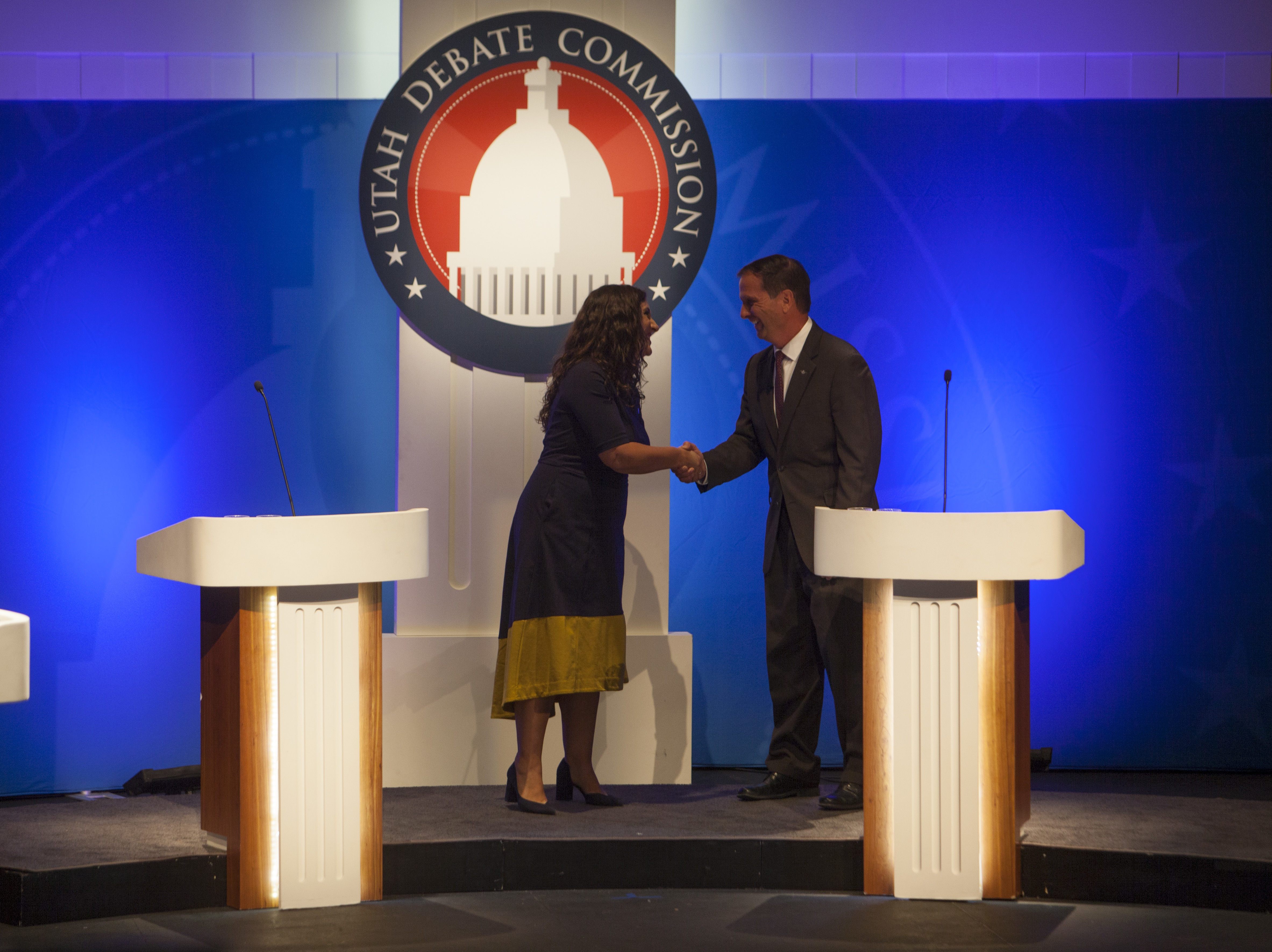 2nd Congressional District candidates Shireen Ghorbani, left, and U.S. Rep. Chris Stewart shake hands at their debate, Monday, Sept. 17, 2018, in St. George, Utah. (Chris Caldwell, The Spectrum via AP)
