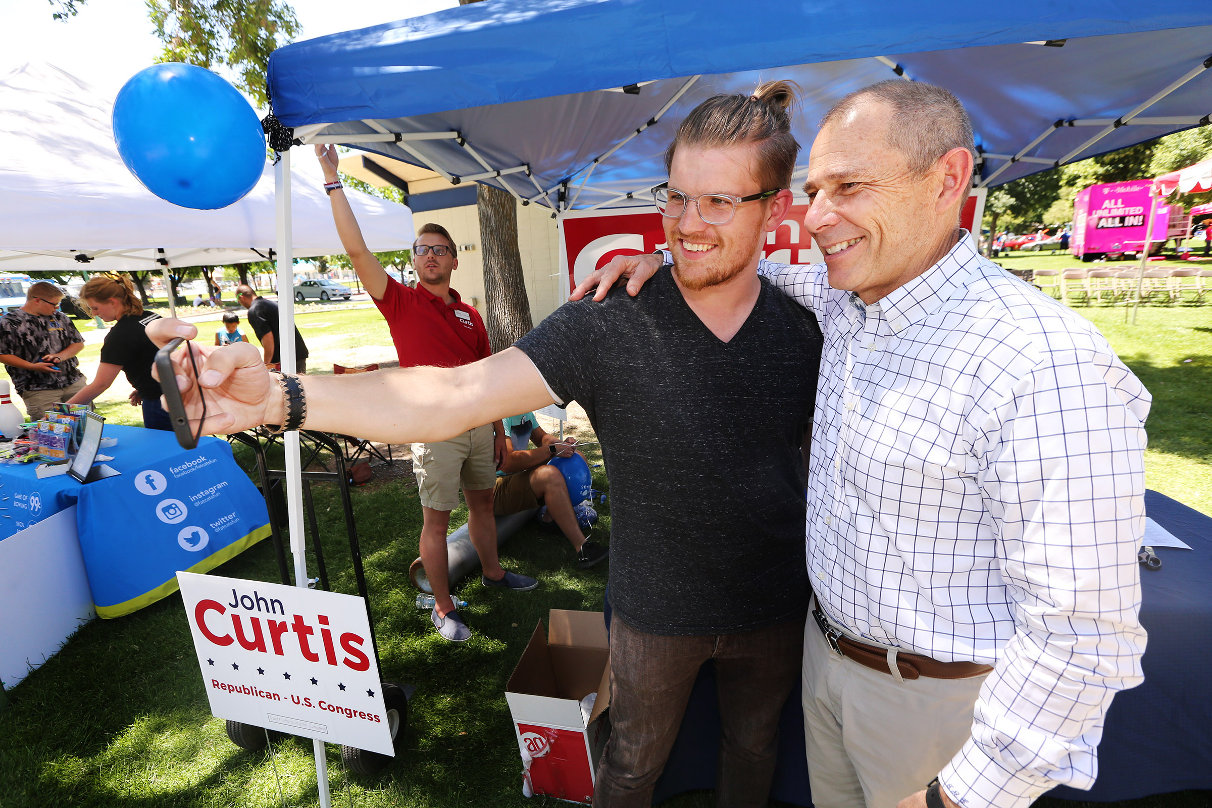 Rob Towne takes a selfie with Rep. John Curtis, R-Utah, in Orem on Saturday, June 9, 2018. (Photo: Scott G Winterton, KSL, File)
