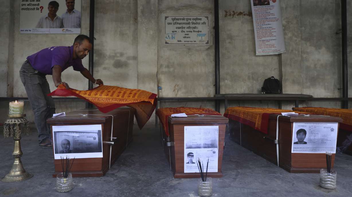 Weeping relatives receive bodies of South Korean climbers