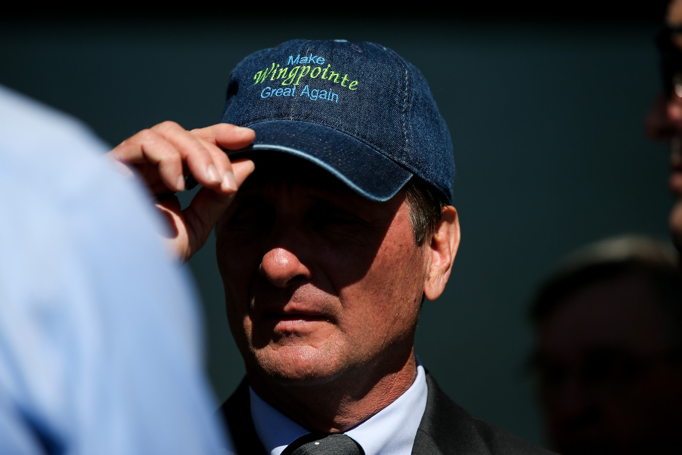 Rep. Chris Stewart, R-Utah, dons a cap that reads "Make Wingpointe Great Again" as he announces the reopening of Wingpointe Golf Course in Salt Lake City on Tuesday, Oct. 16, 2018. Photo: Spenser Heaps, KSL