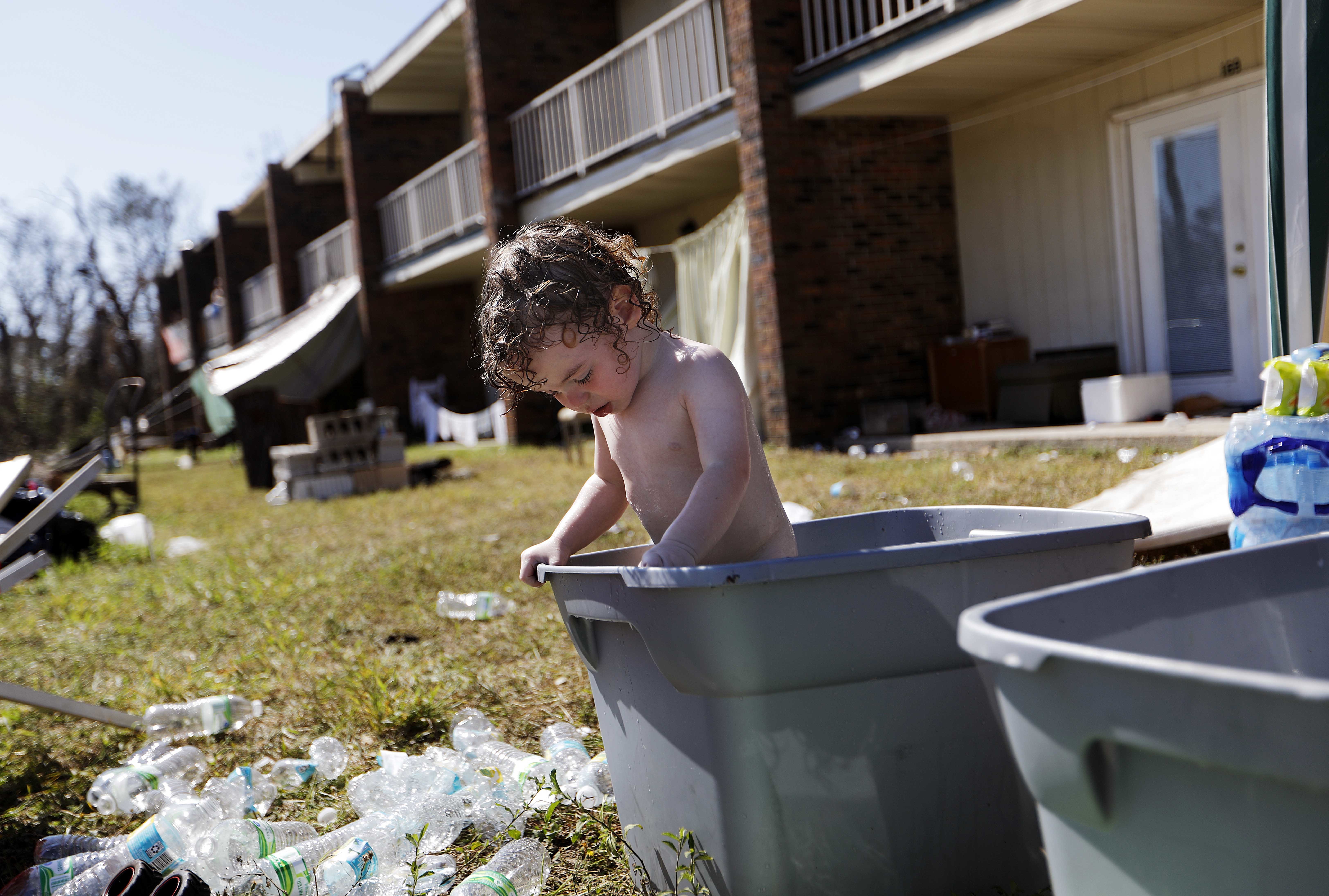 The Latest: Residents return to devastated Mexico Beach