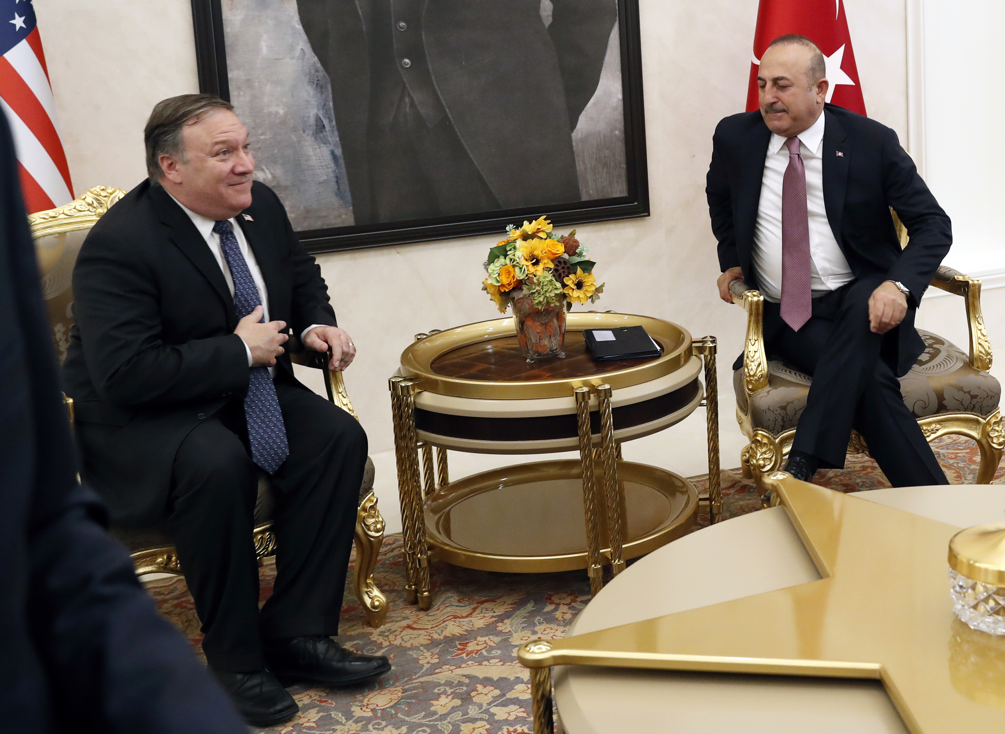 U.S. Secretary of State Mike Pompeo, left, with Turkish Foreign Minister Mevlut Cavusoglu before their official talks in Ankara, Turkey, October 17, 2018. Photo: AP Photo