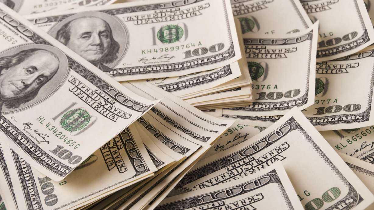 A Riverdale woman was charged Wednesday with embezzling nearly $600,000 from her employer since 2018 allegedly to pay off her credit card debt.