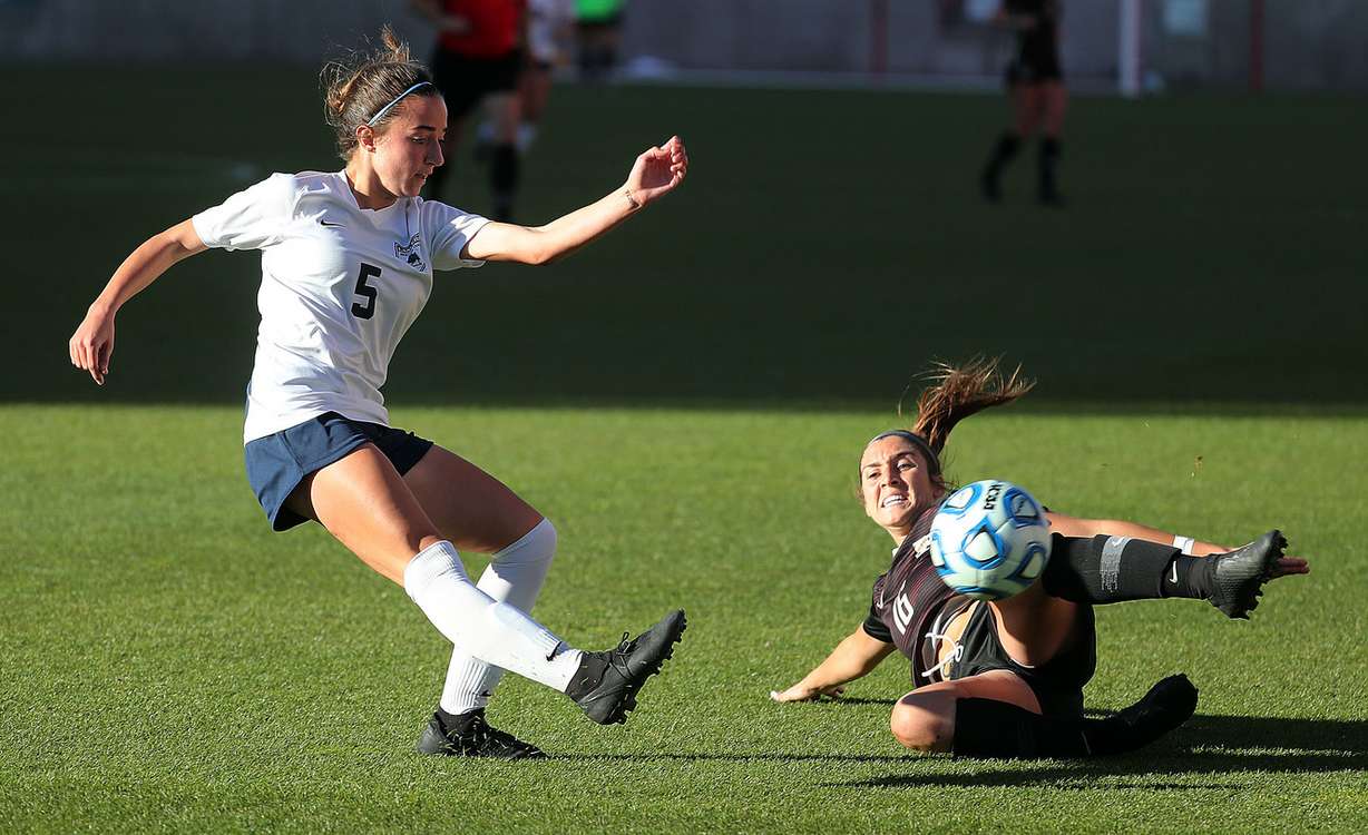 Abby Fotheringham, left, of Layton, and Nicole Ray of Lone Peak fight for control of the ball during the girls high school 6A state championship soccer game in Sandy on Friday, Oct. 19, 2018. (Photo: Ravell Call, Deseret News)