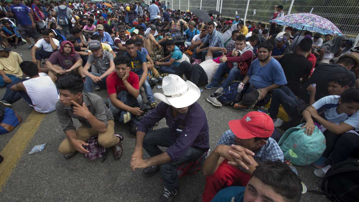Migrants vow to re-form caravan, continue north toward US