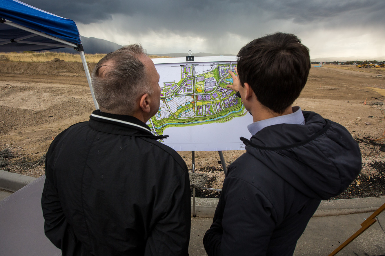 People take a look plans for phase 2 of View 72 at Jordan Bluffs, a former Environmental Protection Agency Superfund site, in Midvale on Monday, Oct. 22, 2018. (Photo: Qiling Wang, KSL)