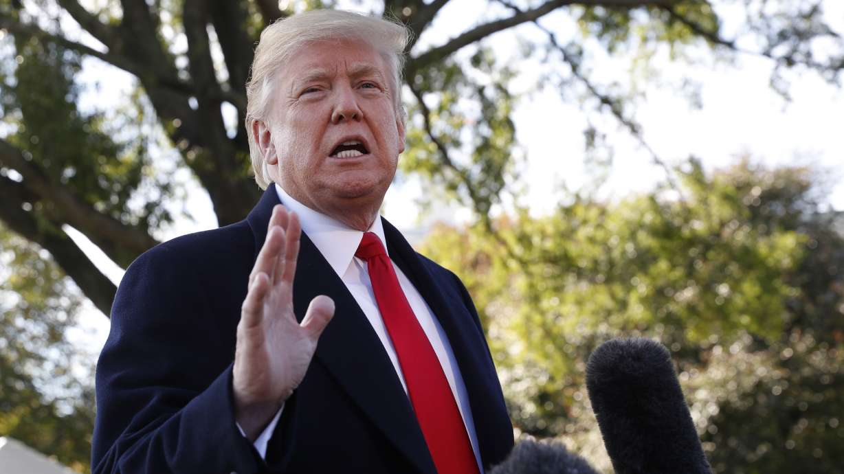 Trump vilifies caravan, says he'll cut Central American aid