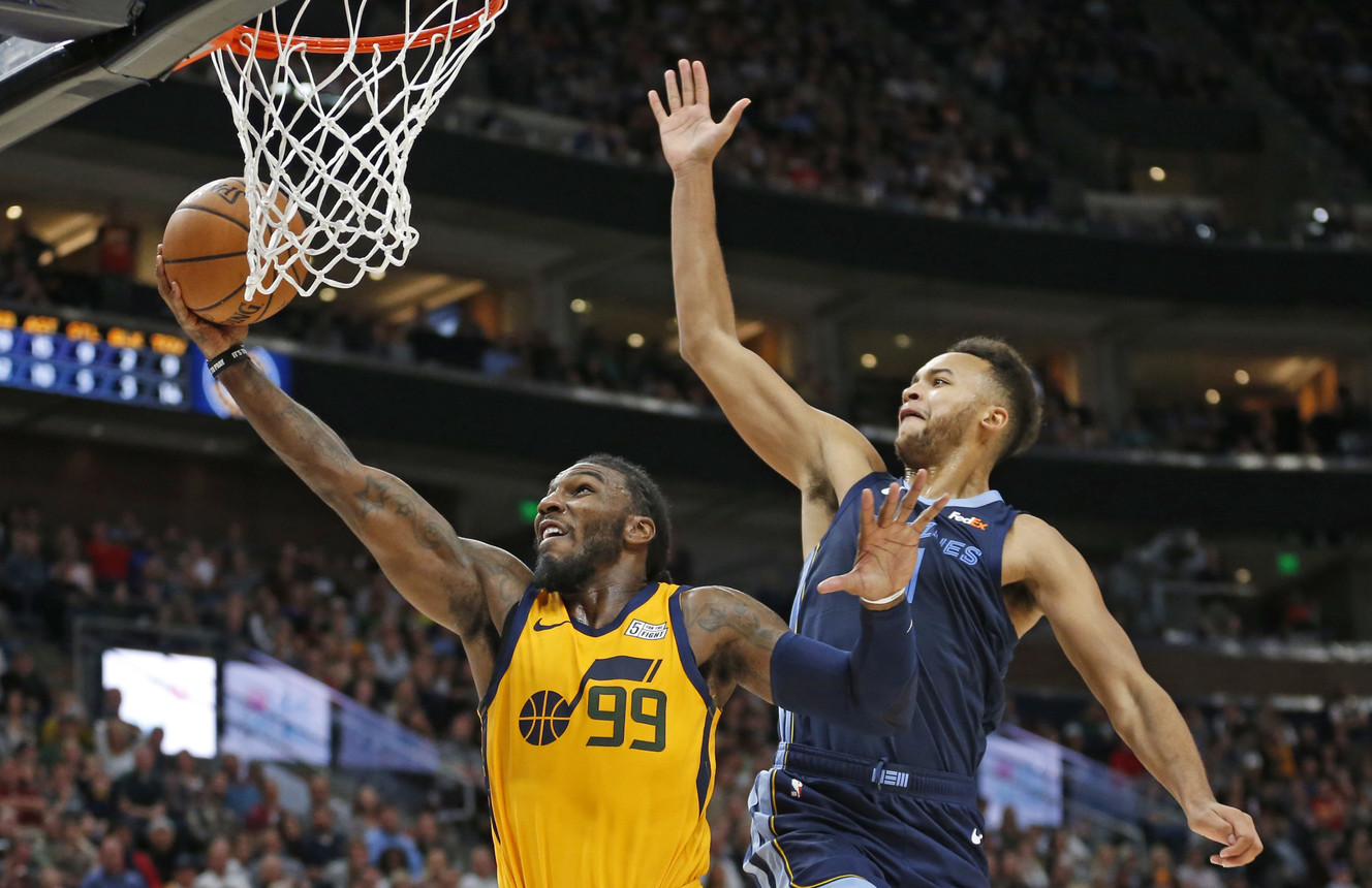 Utah Jazz forward Jae Crowder (99) lays the ball up as Memphis Grizzlies forward Kyle Anderson, right, defends in the second half of an NBA basketball game Monday, Oct. 22, 2018, in Salt Lake City. (Photo: Rick Bowmer, AP)