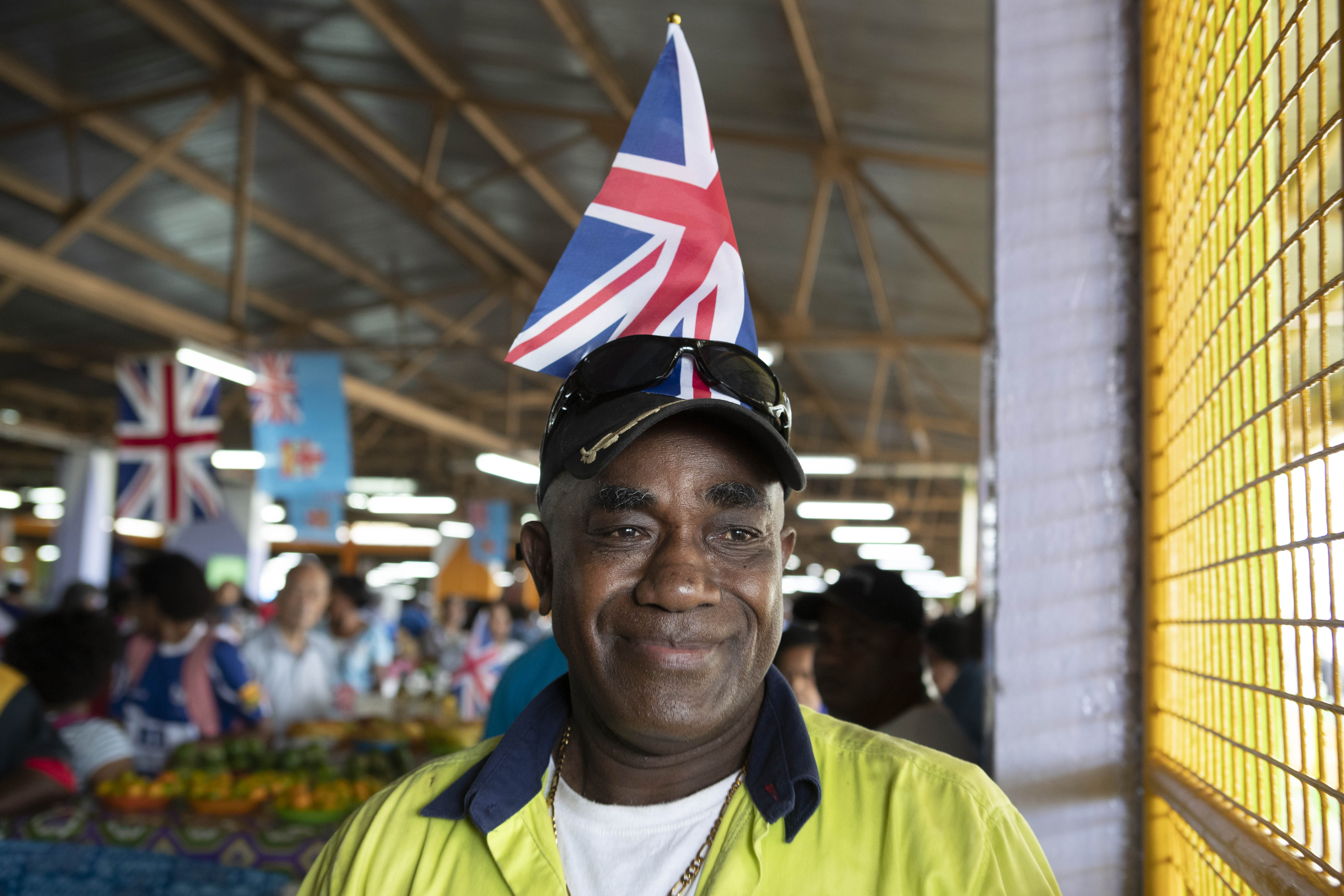 Meghan rushed through Fiji market filled with royal-watchers