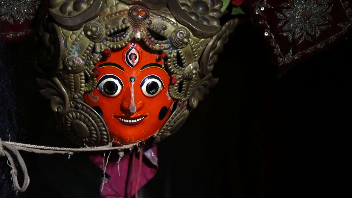 AP PHOTOS: Nepal's masked dancers mark the end of monsoon