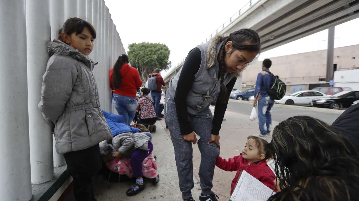 Long odds and slow lines await migrant caravan at US border