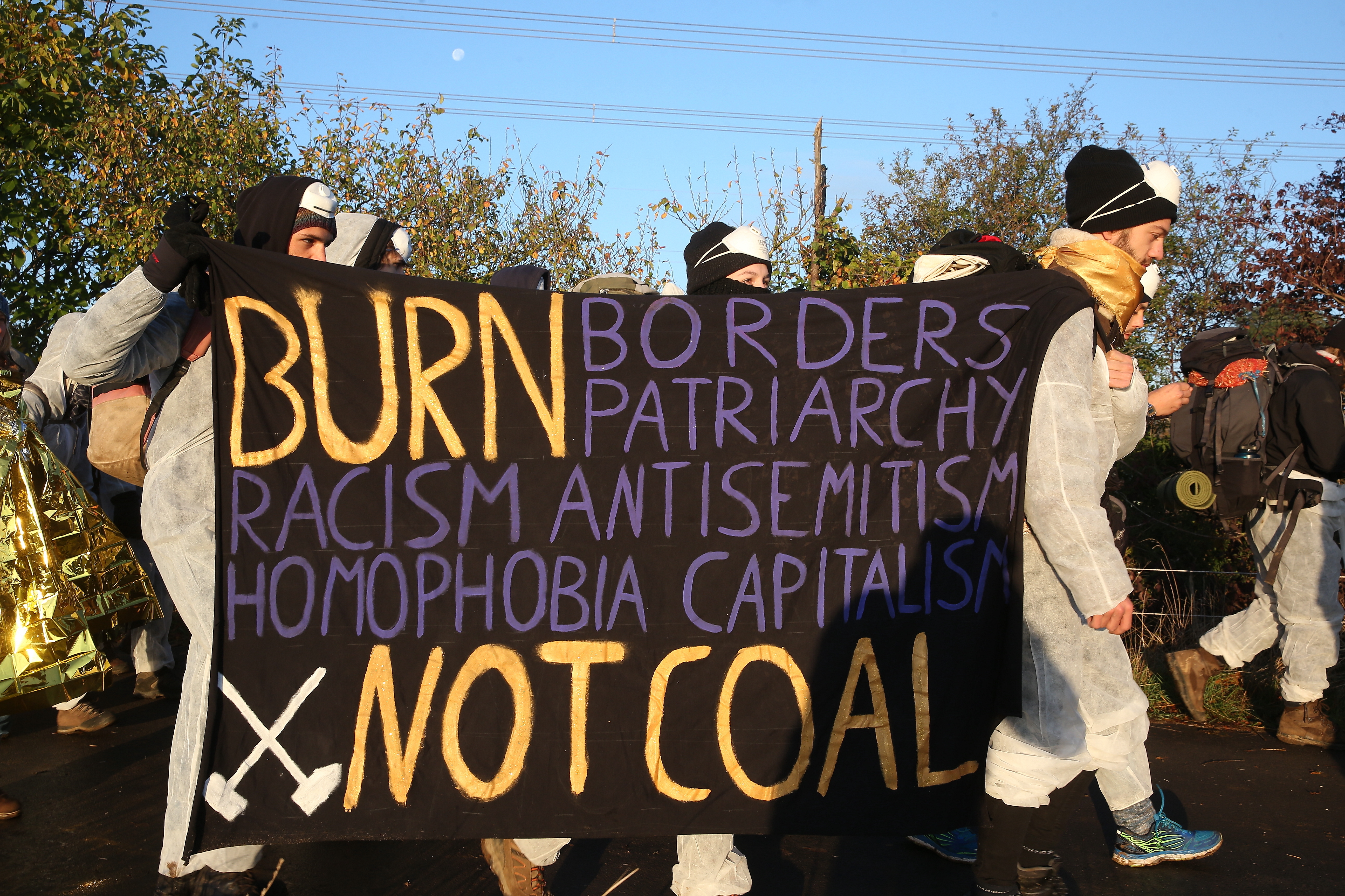 Protesters in Germany block tracks to disputed coal mine