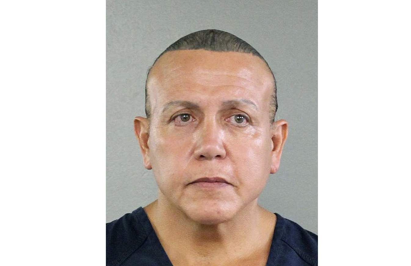 Many of bomb suspect's conspiracy theories tracked Trump's