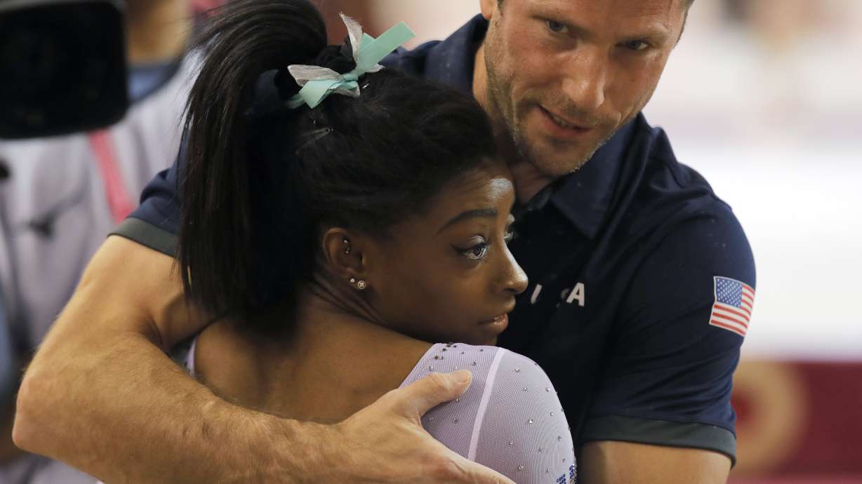 Biles, not at exquisite best, wins 4th all-around at worlds